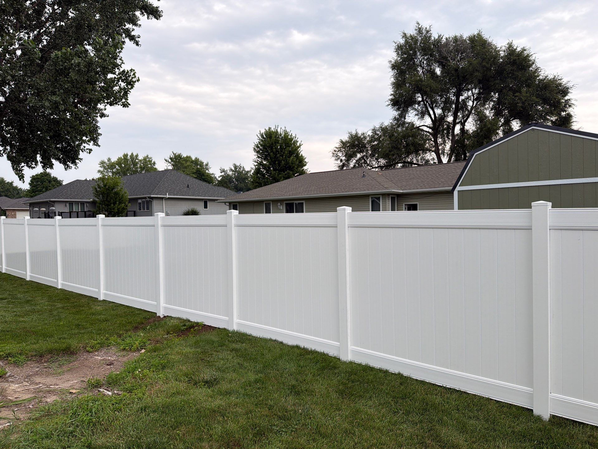 White Vinyl Privacy Fence and Double Gate Installation in Jesup by Perfect Picket Fence and Stain