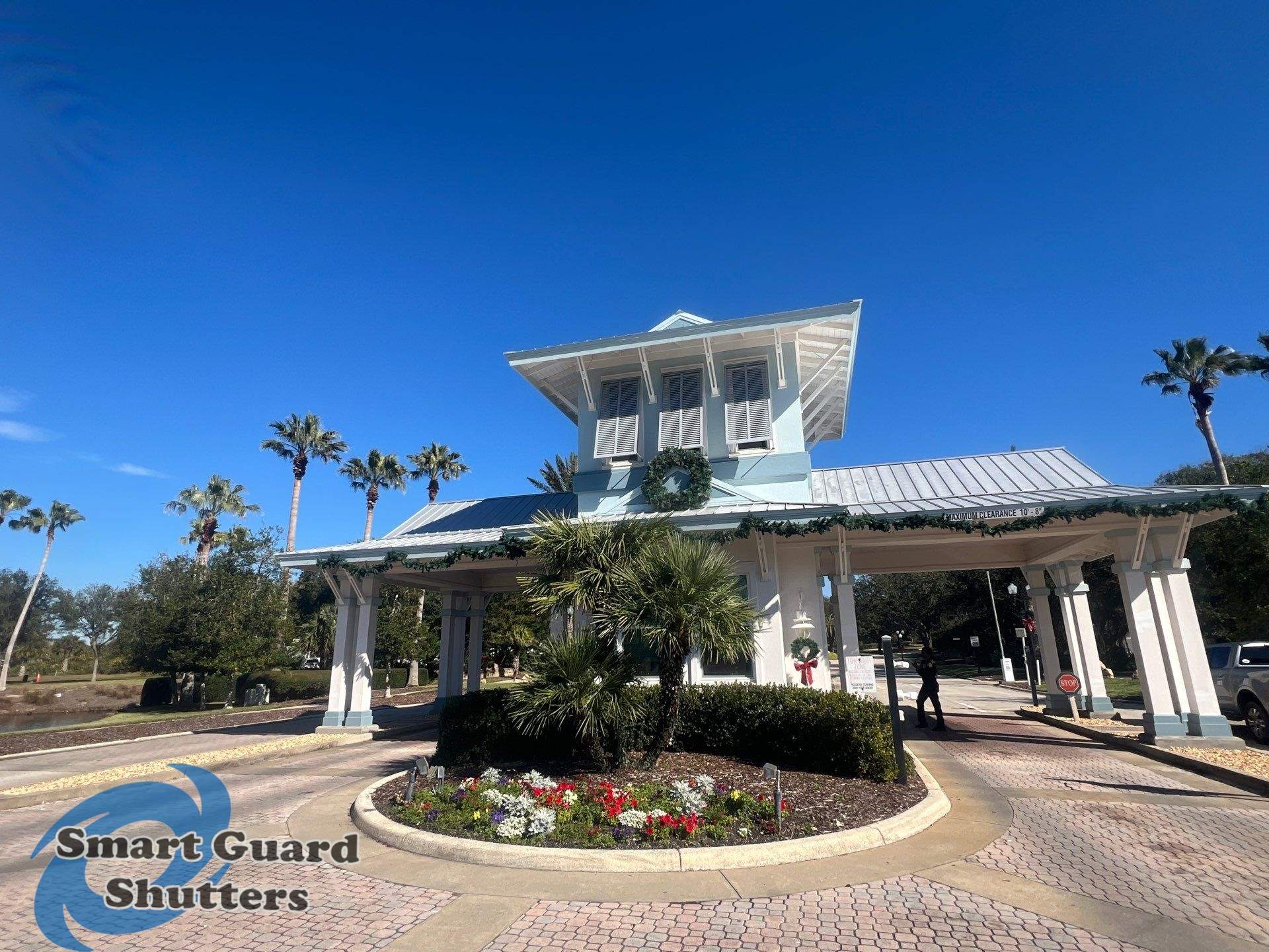 Decorative Bahama Shutters in Window Grey by Smart Guard Shutters