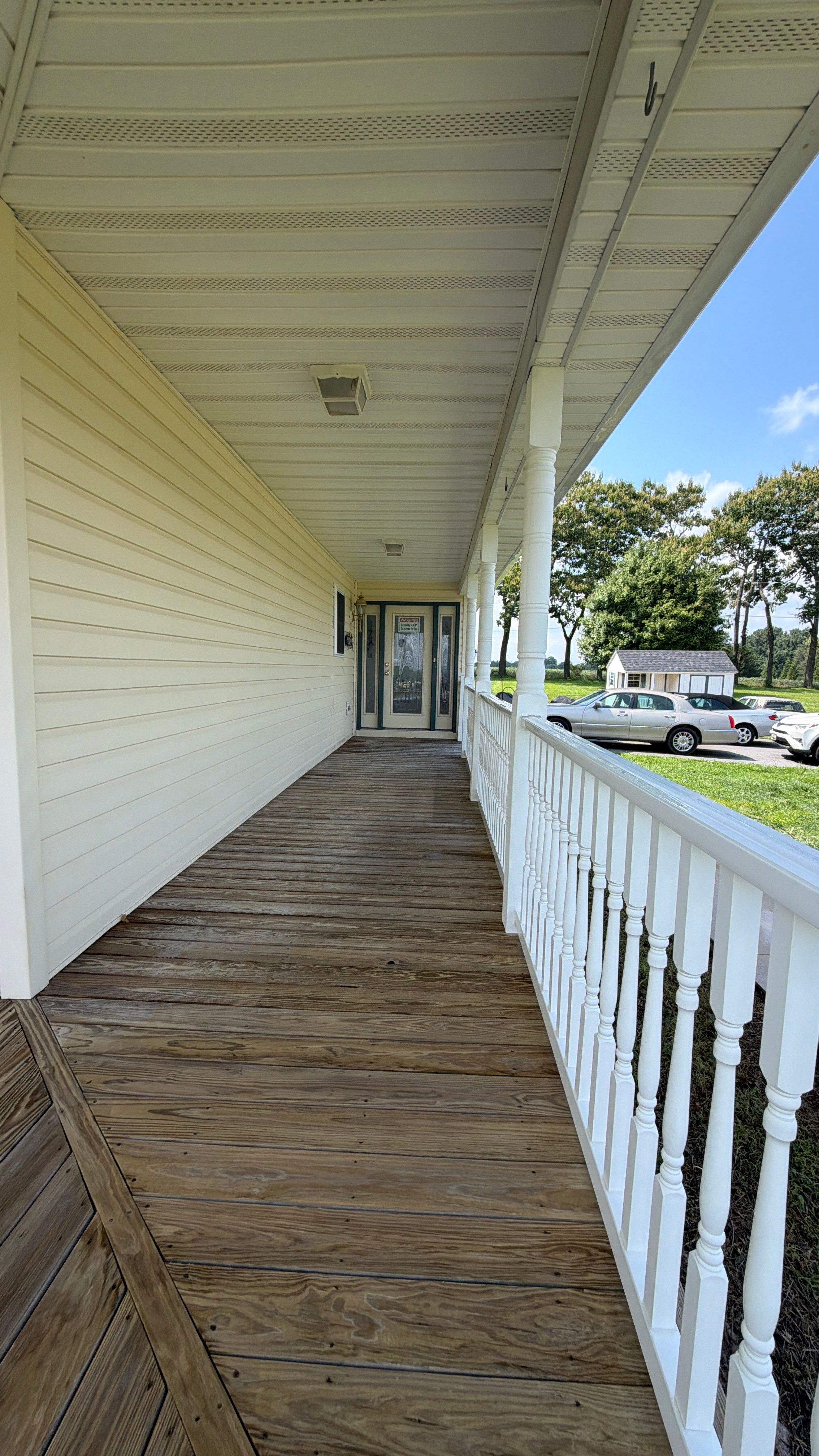 Vinyl Siding House Washing and Wood Deck Restoration in Carroll County by Baltimore Pressure Washers Inc.