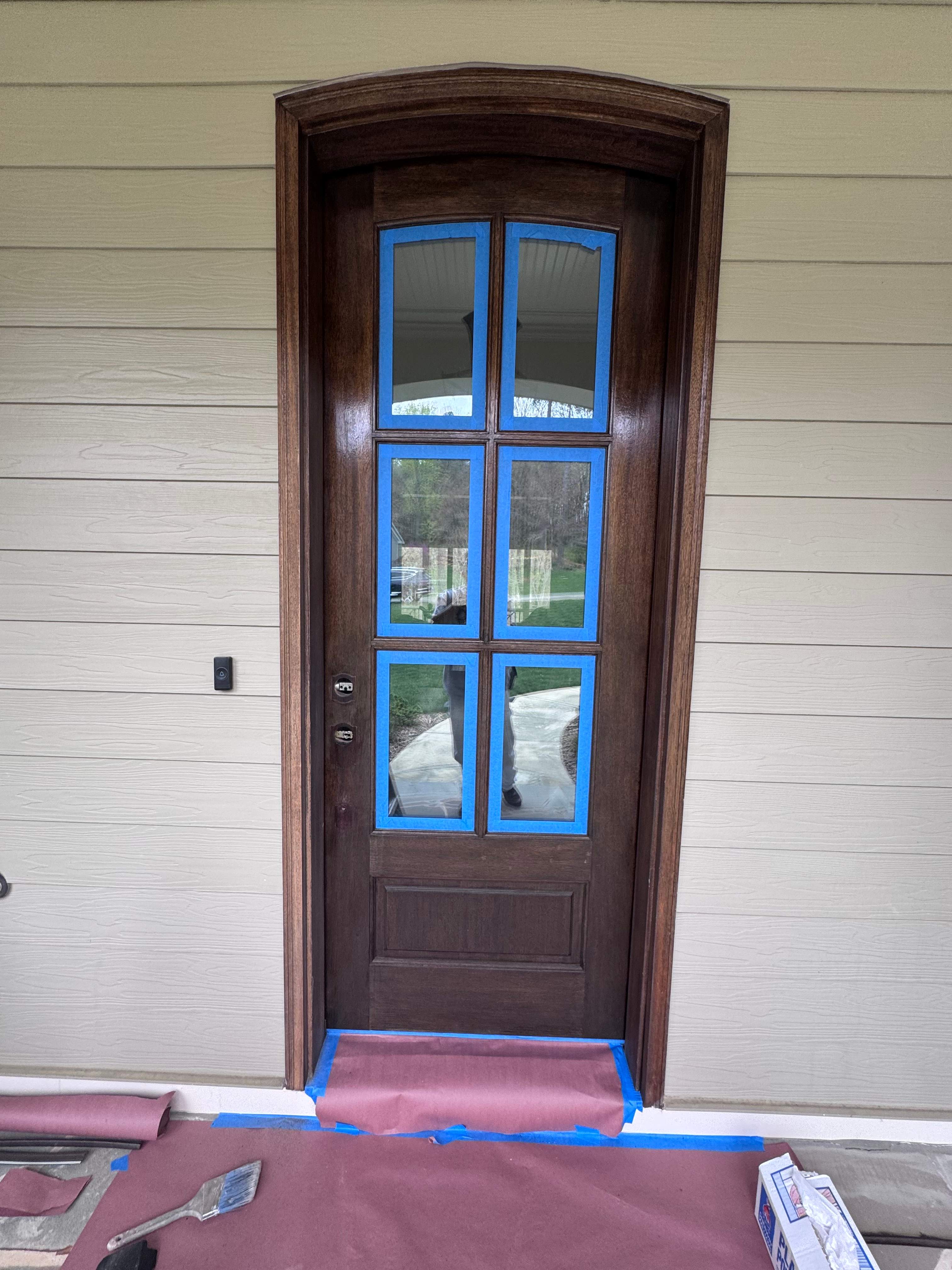 Front door change by GonzalezPainters & Contractors Inc 