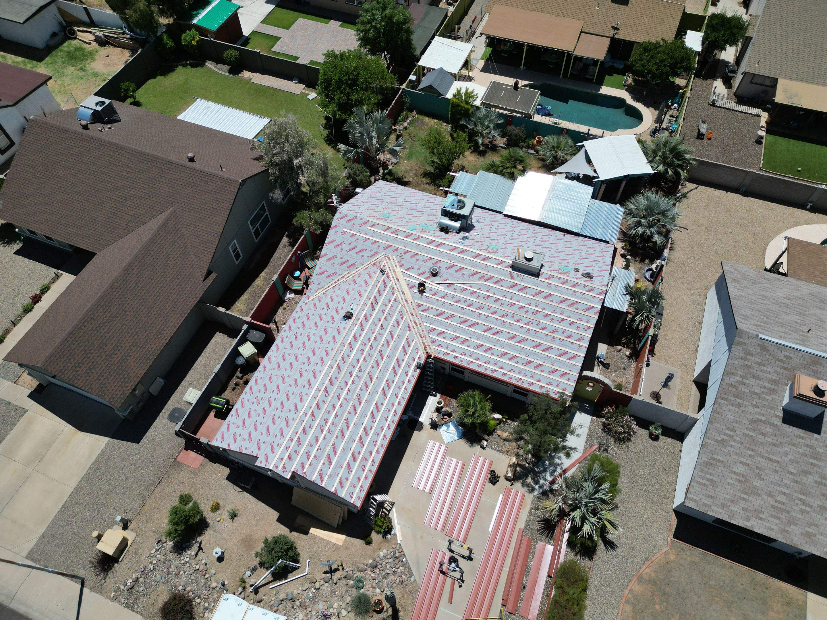 Terra Cotta Exposed Fastener by Reimagine Roofing