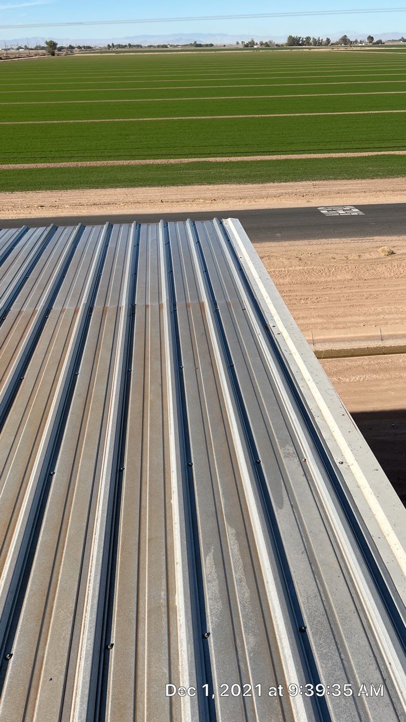 Metal roof restoration on commercial roof using Conklin Benchmark/PUMA XL fabric and coating by Straight Edge Roofing Inc