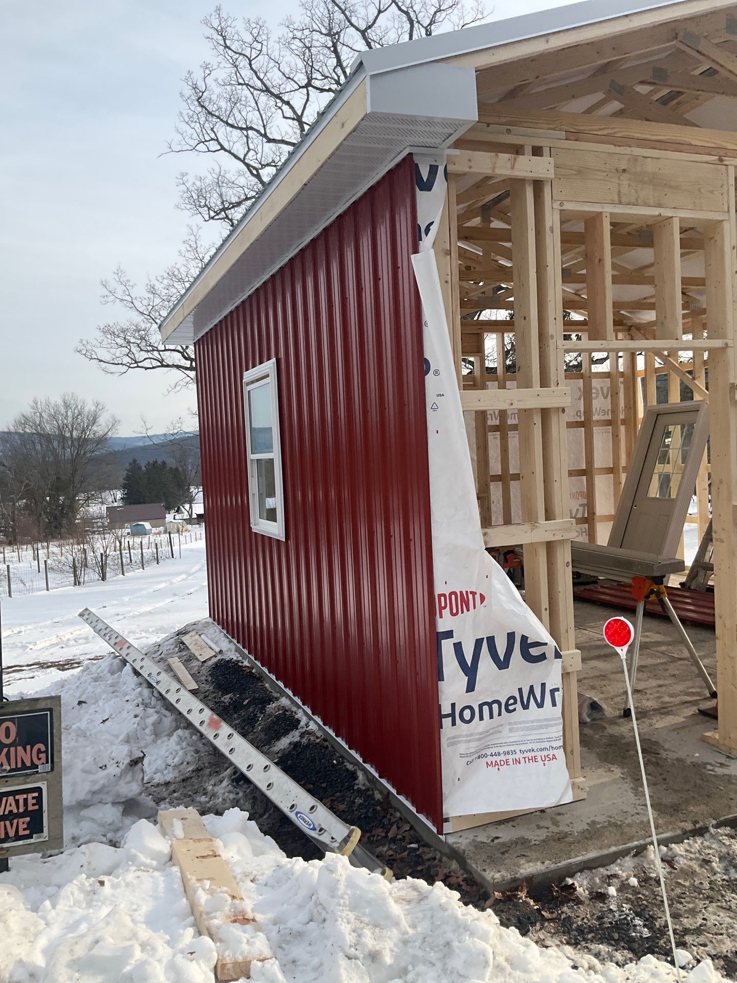 New Red Metal Garage Construction and Residential Window Replacement in Ashland by Esh Builders