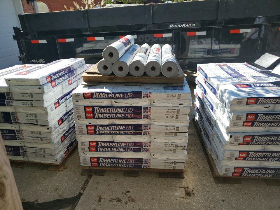 Residential Roofing Installation using Roof Replacement by American Roofing & Construction LLC
