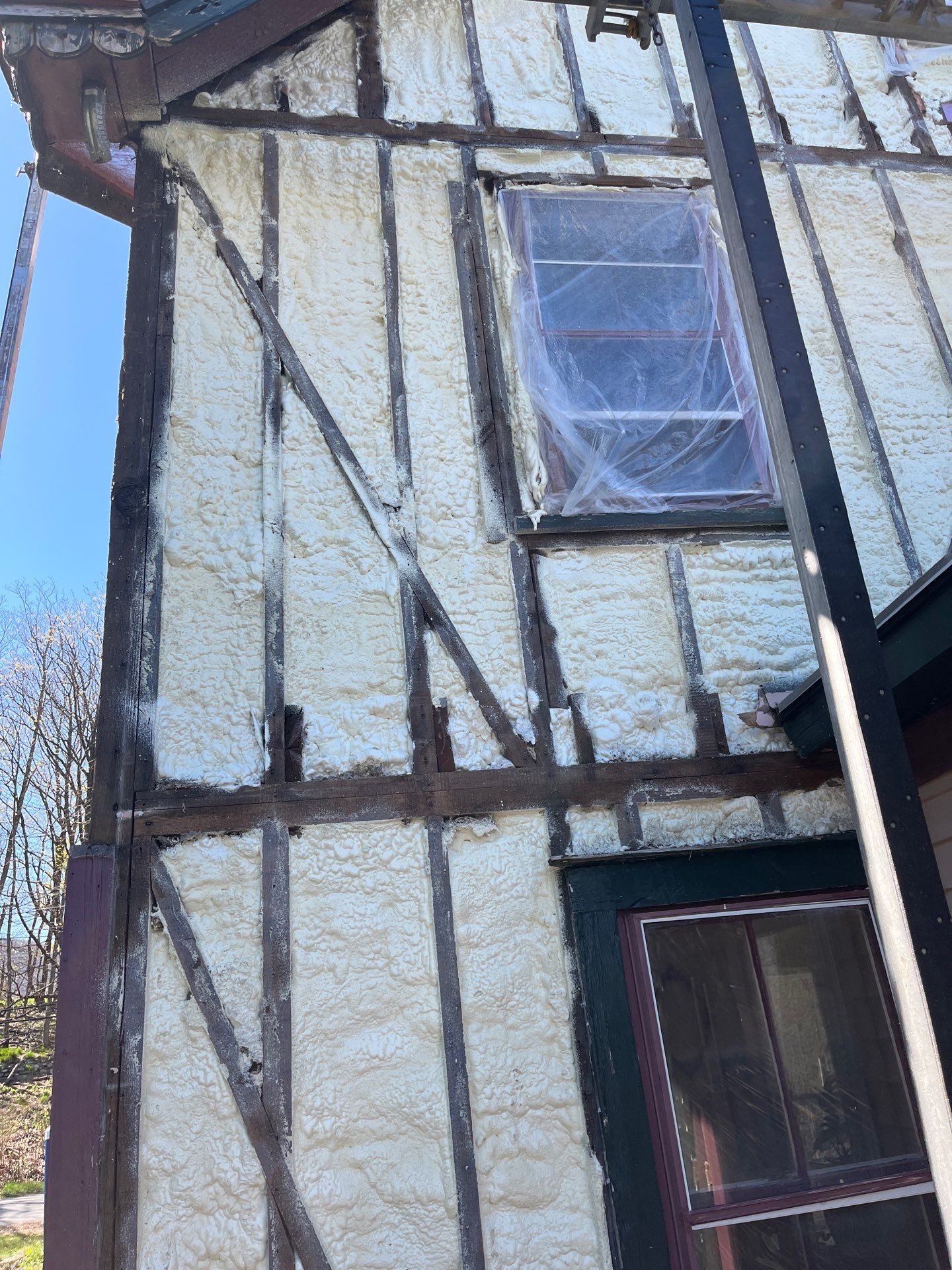 Siding Installation using Closed Cell Spray Foam by NYS Foam & Energy