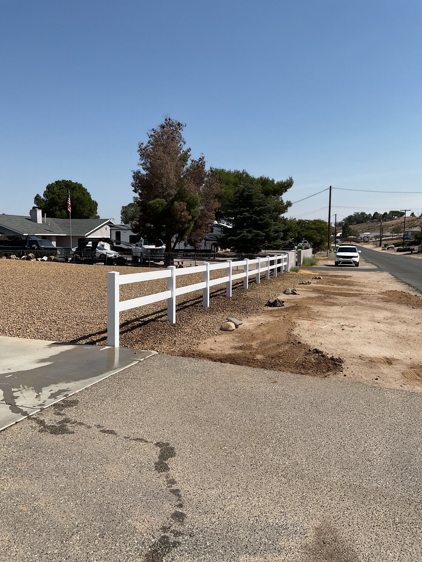 2-Rail Ranch Vinyl Fence  by Fence Guys Inc. 