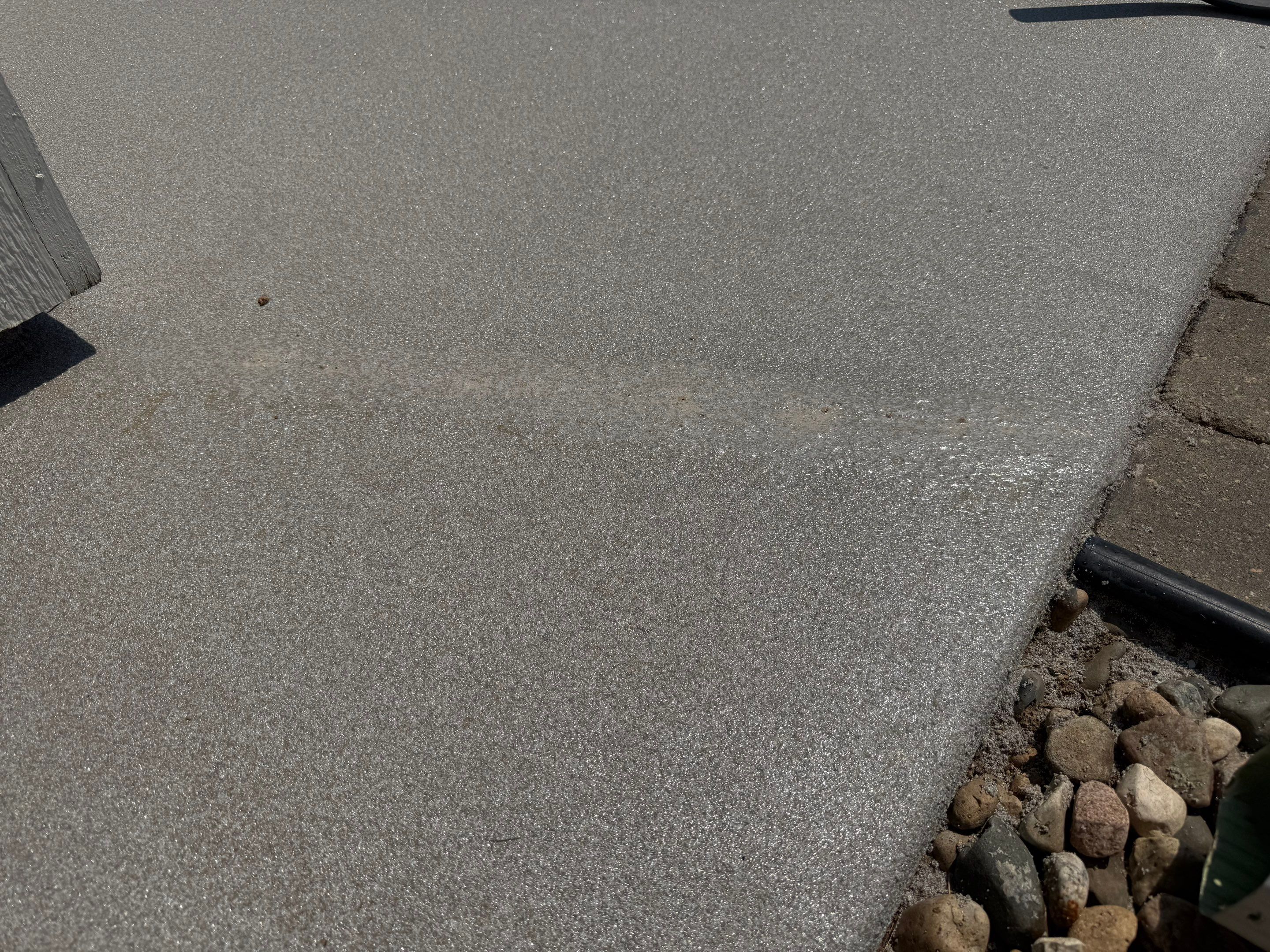 Concrete Patio Coating with Fuzzy Wool Finish in Sioux Falls by Select Painting, Coatings & Garage Cabinets