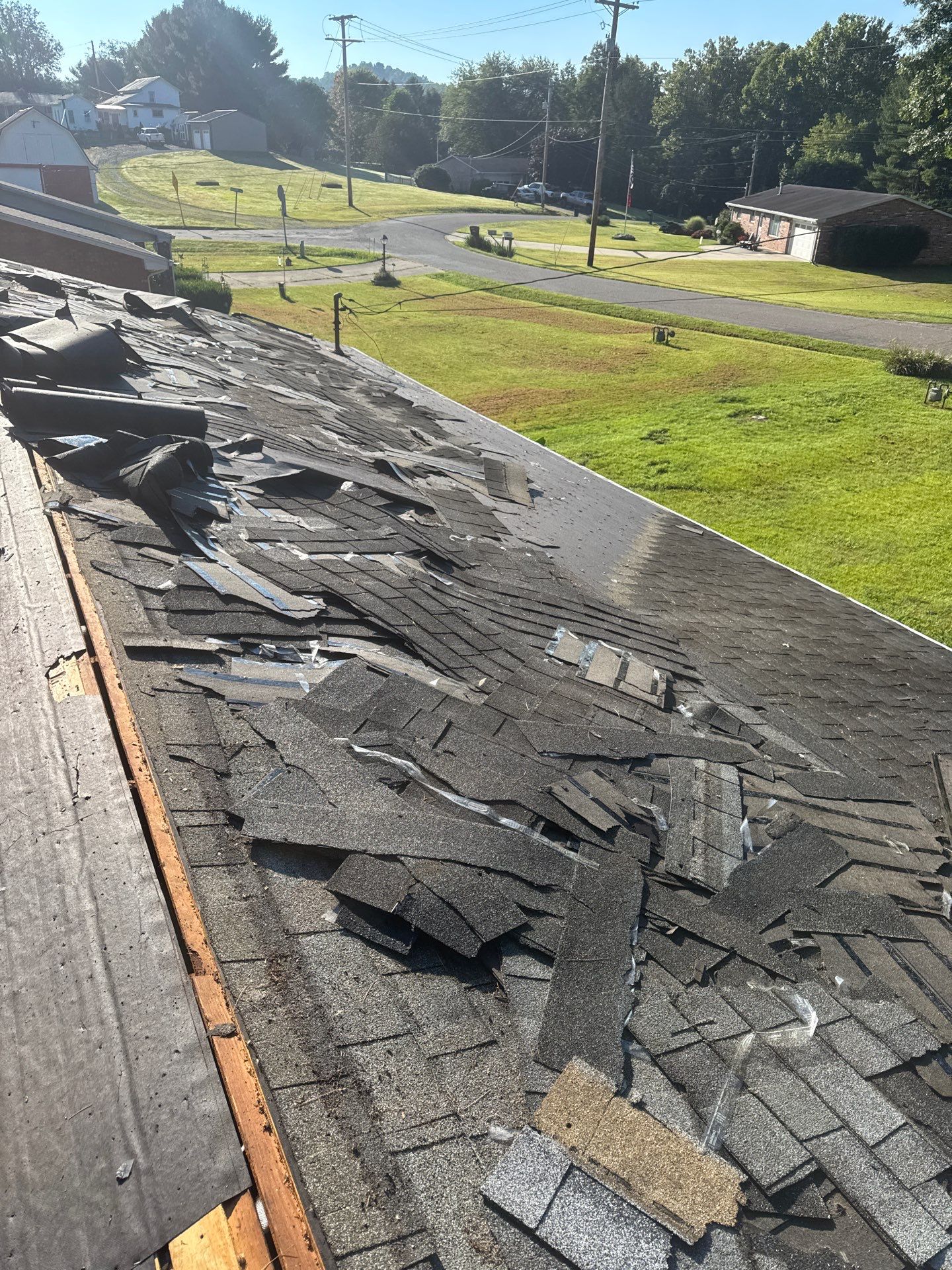 Residential Roofing Installation using GAF Timberline HDZ Charcoal by Rainstoppers Roofing