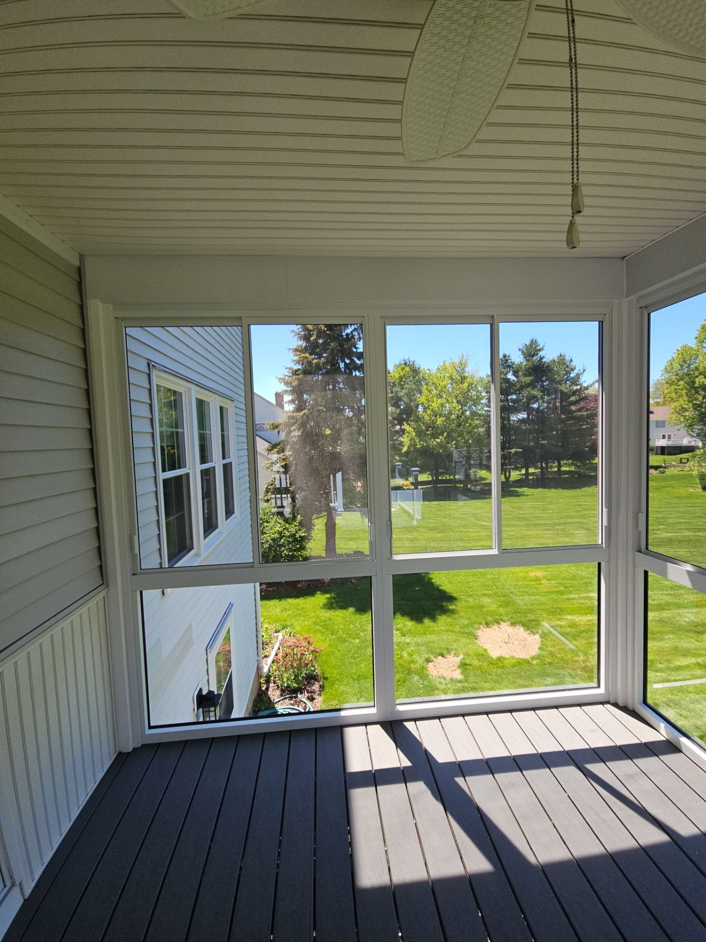 Summer Space Porch Enclosure Transformation by DiGiorgi Roofing and Siding Inc