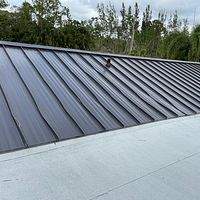 24ga 1.5" Mechanical Seam Dark Bronze by Total Roofing System The Metal Roof Experts