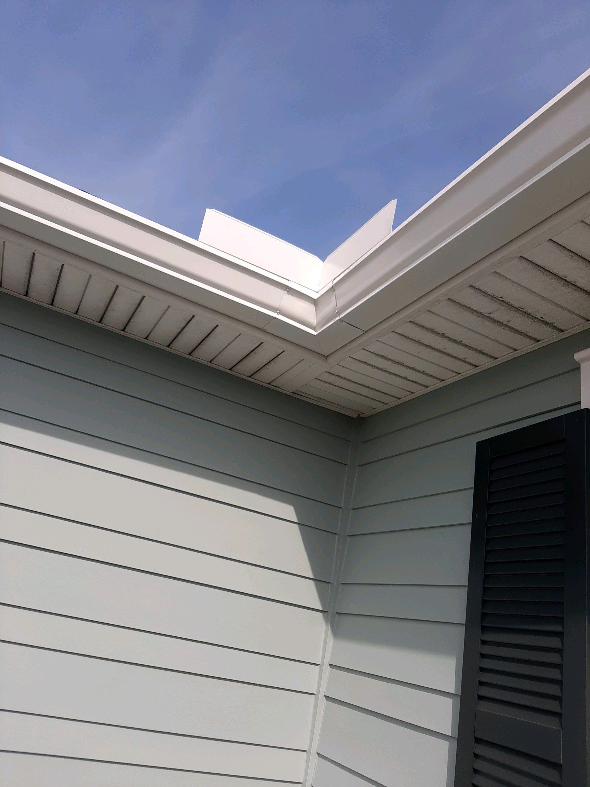 Gutter Installation Using White K-Style 6 Inch Seamless Gutters by Gutter Professors