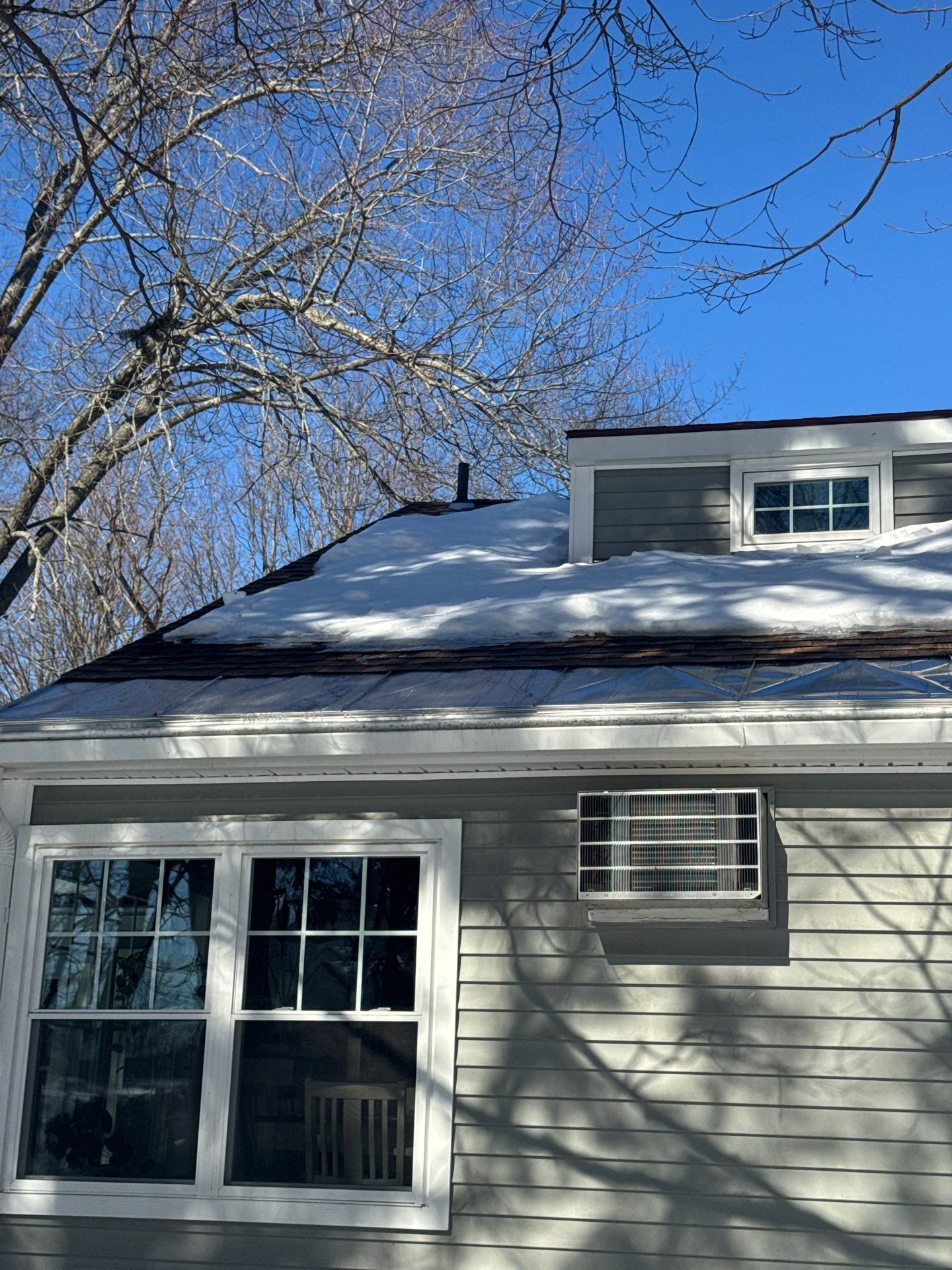 Snow/Ice Belt & Ice Dam Removal Project in Woburn by Mighty Dog Roofing of Greater Middlesex County