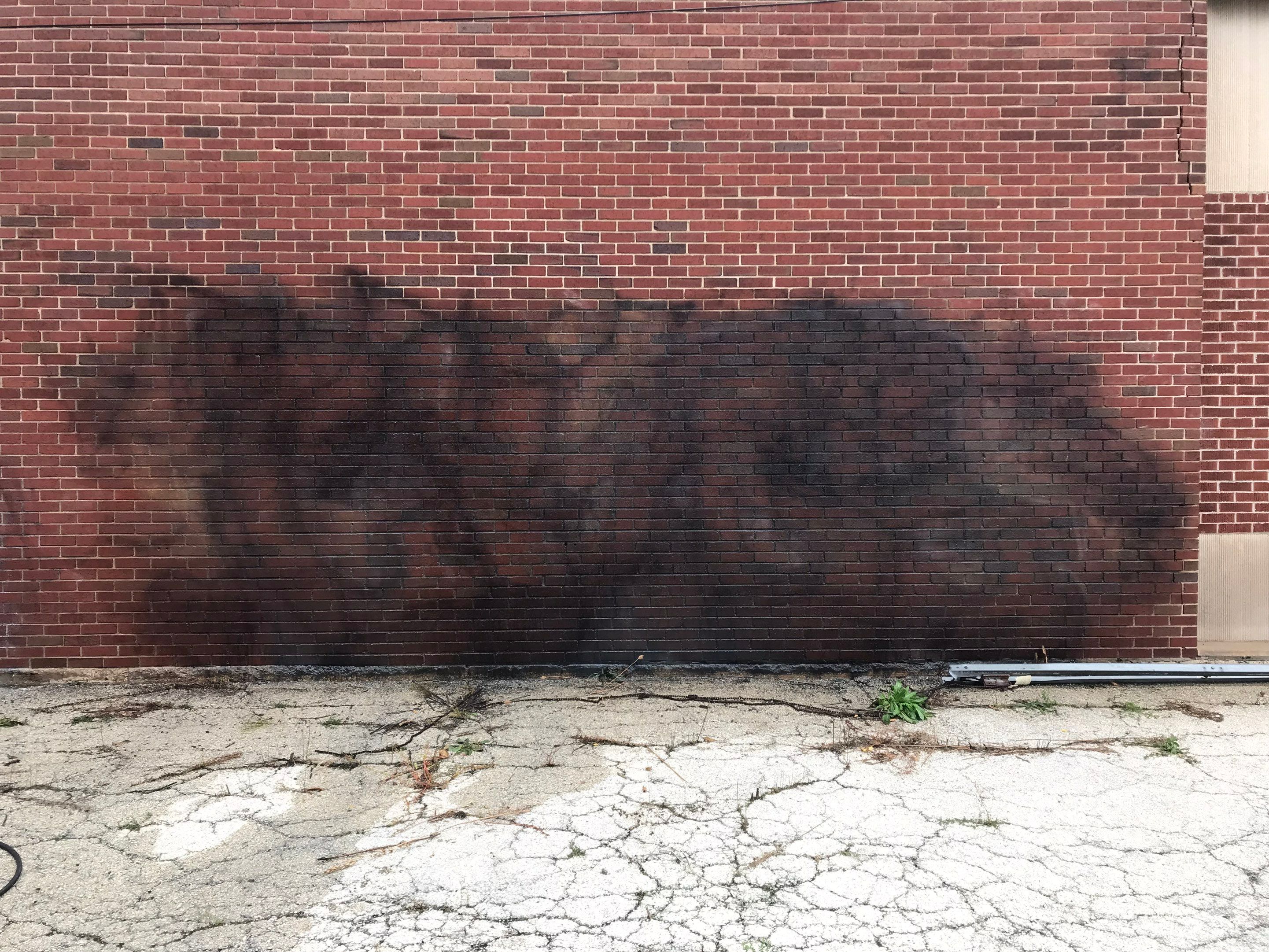 Graffiti removal  using Graffiti remover by Northern Power Washing LLC.