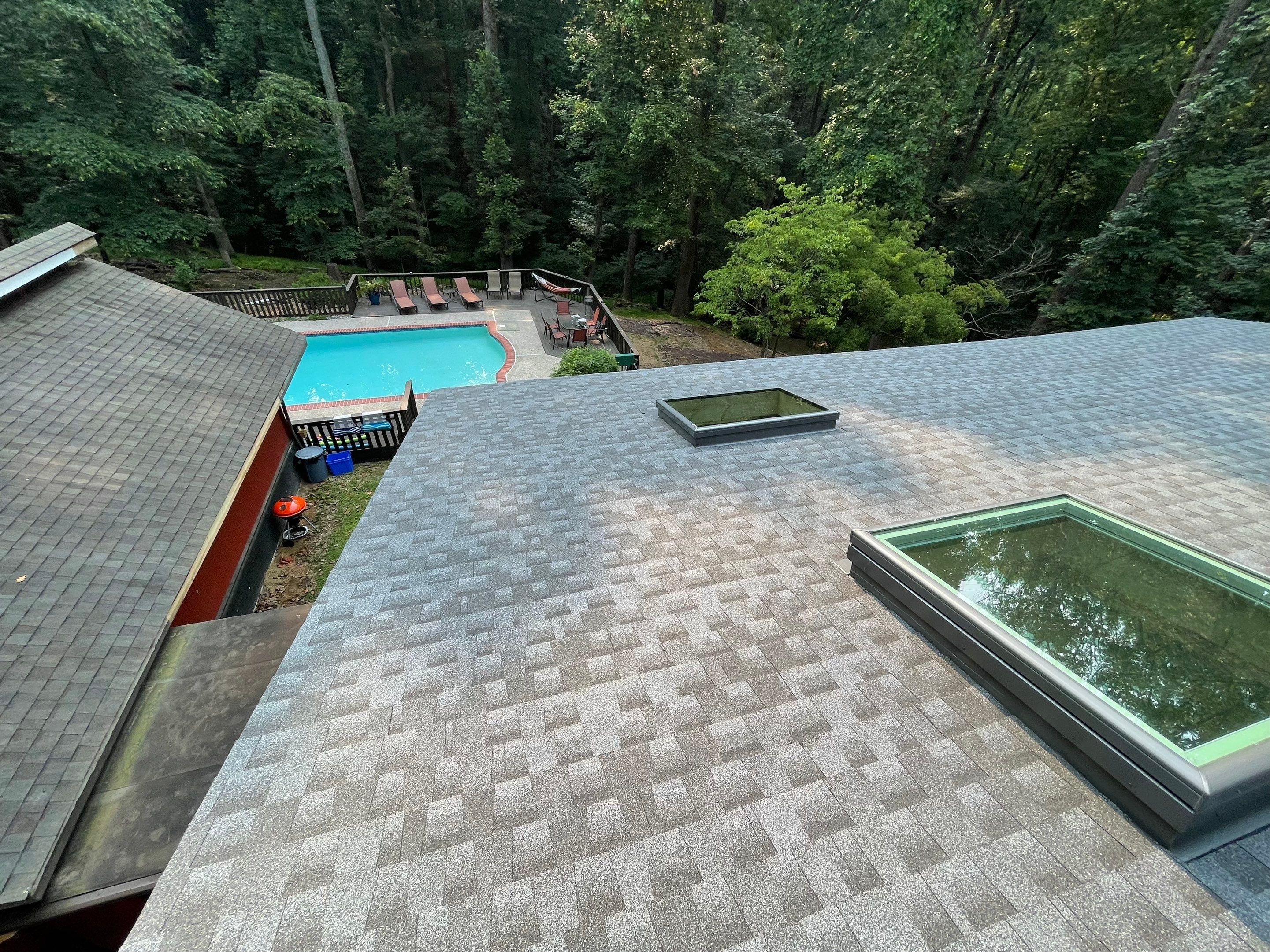 Deckhouse Roof Replacement by American Home Contractors