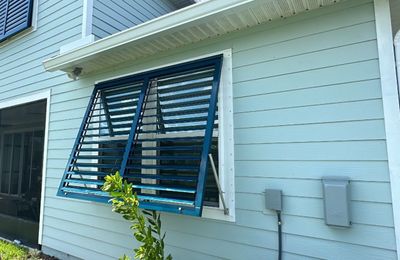 Hurricane Rated Bahama Shutters in Ocean Blue