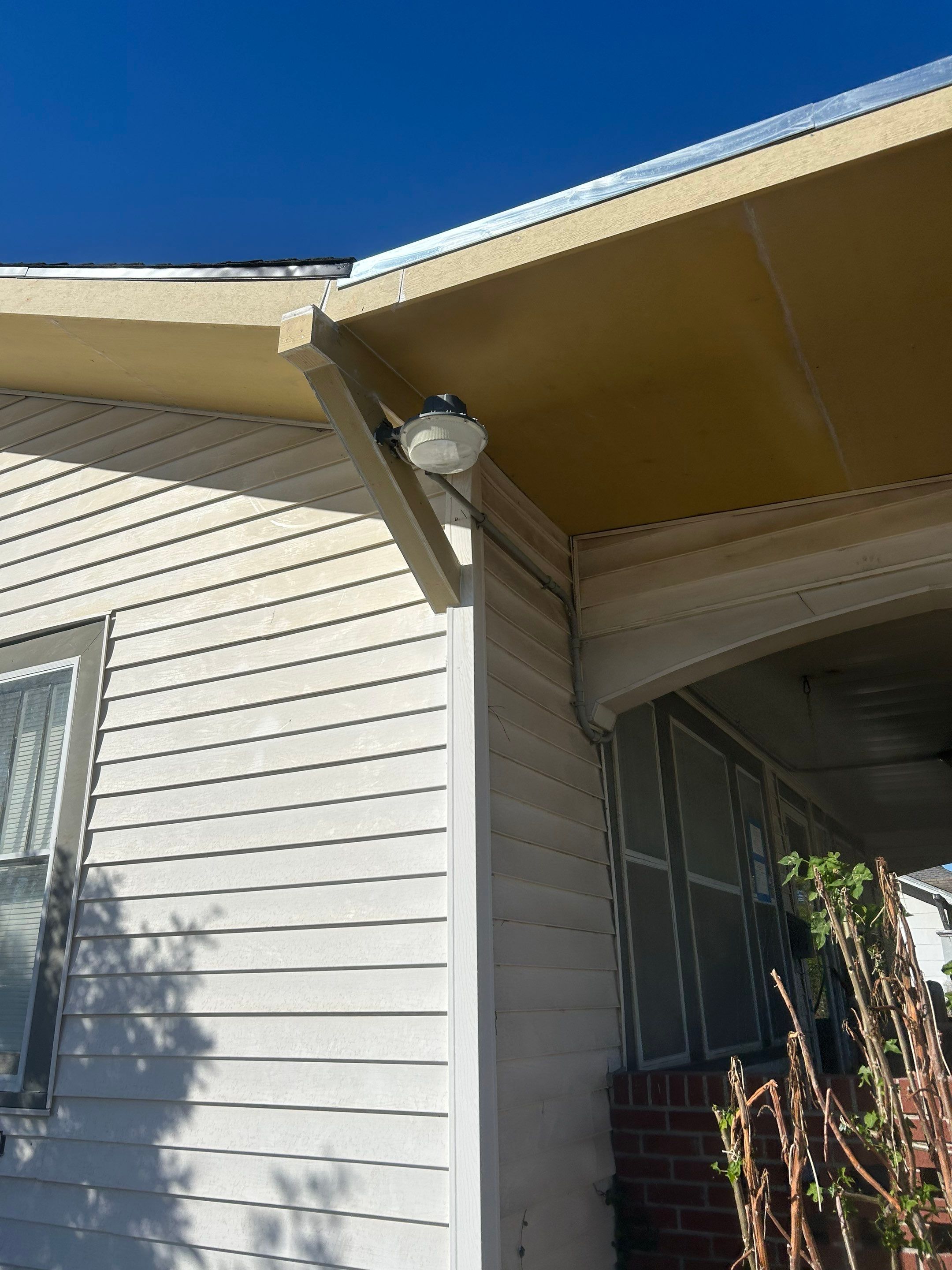 Mid-Century Bungalow by Bayfront Roofing and Construction