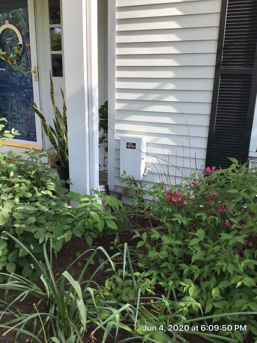 James Hardie Siding  using James Hardie Board and Batten, White by Absolute Roofing and Construction