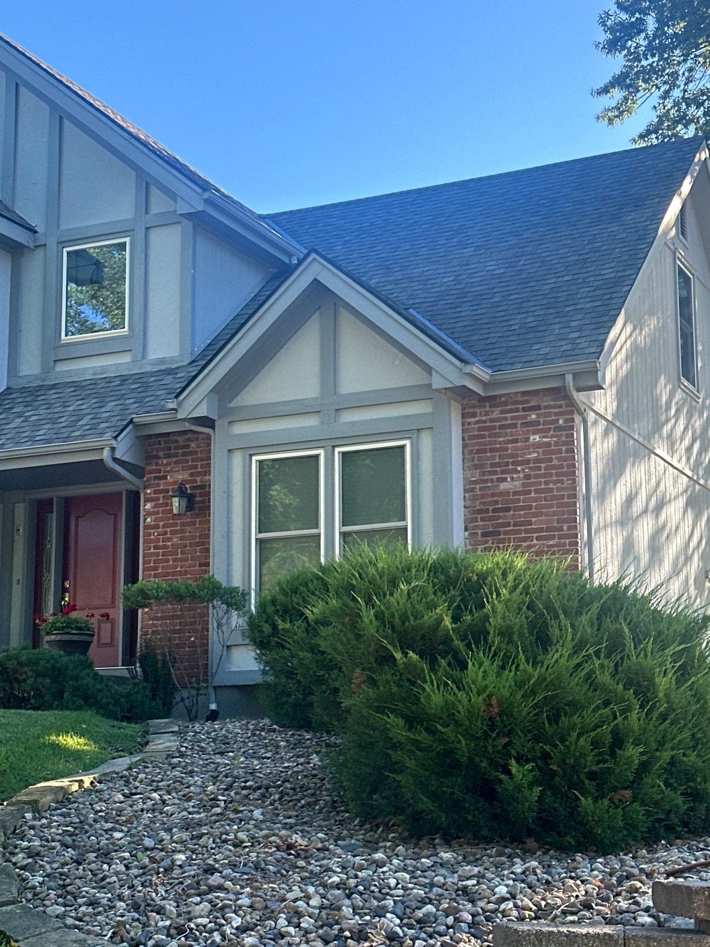 Whole Home Siding Replacement and Gutter Installation in Gladstone by EEC Windows, Siding & Roofing