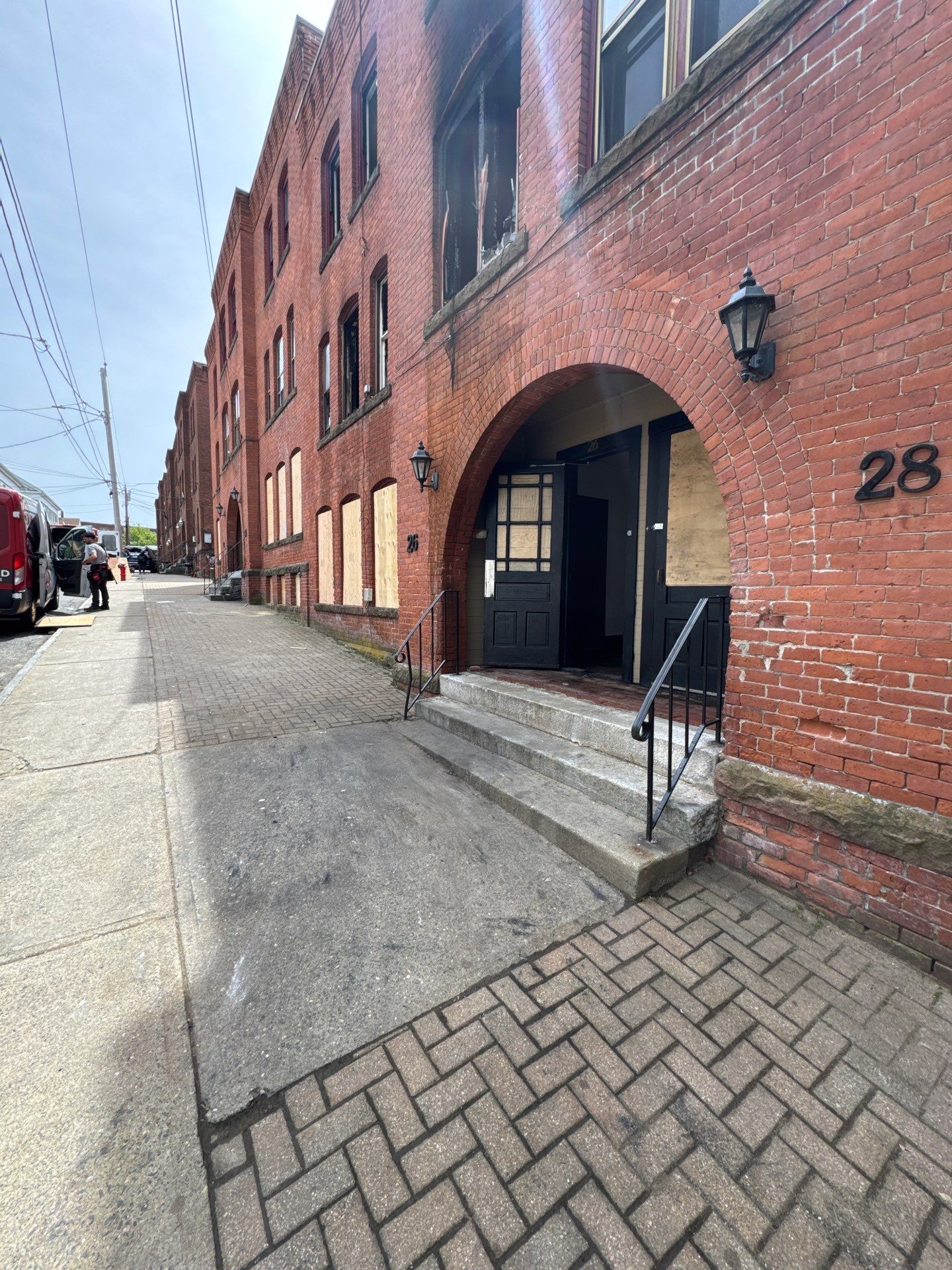 Emergency Board Up Services for Fire-Damaged Apartment Building in Ware by Boston Board Up