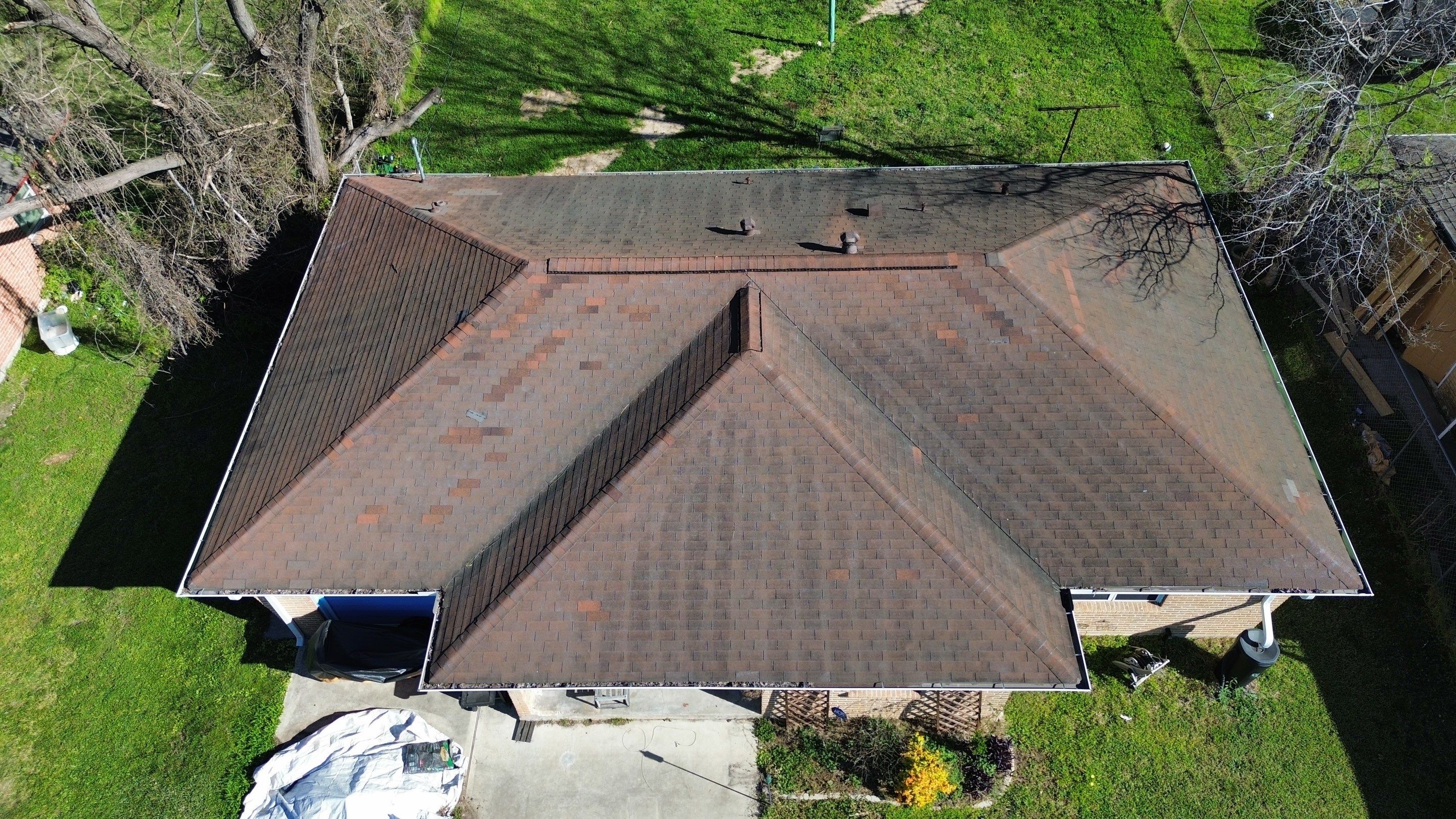 Houston Residential Roof Replacement Using Harbor Blue Architectural Shingles by Houston Roofing & Construction