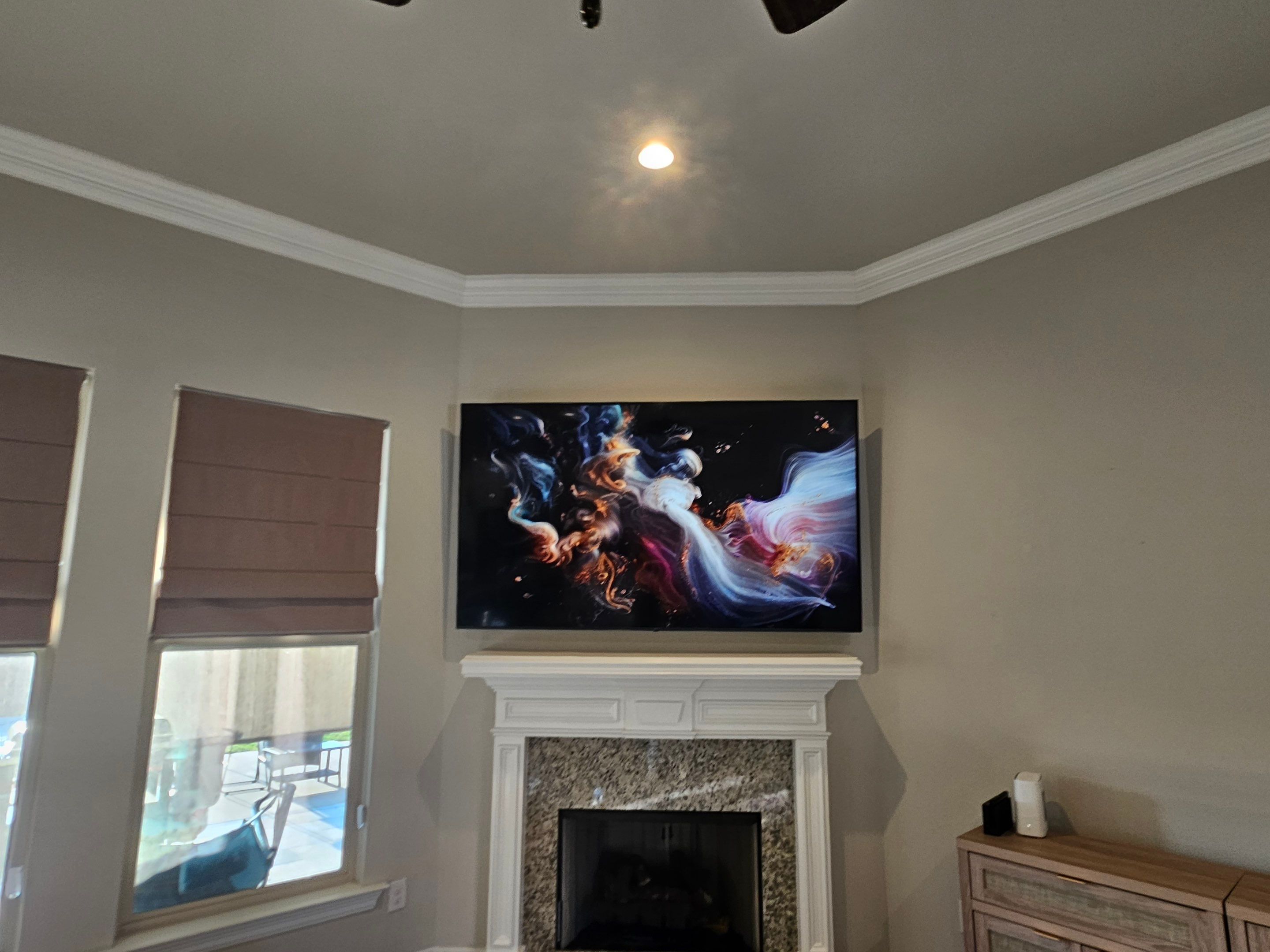 Fireplace TV Mounting Projects by Hangman Mounting & Installation 