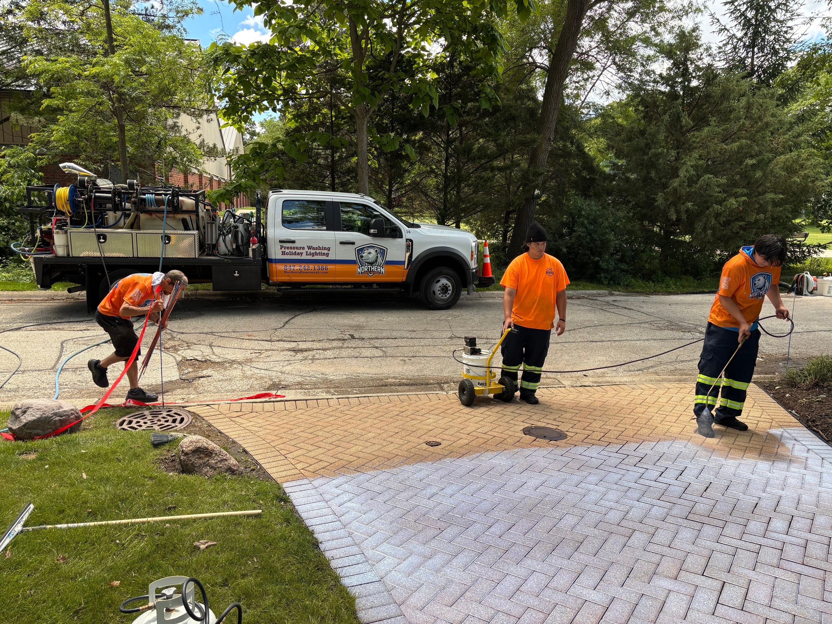 Brick paver repair, cleaning and sealing by Northern Power Washing LLC.