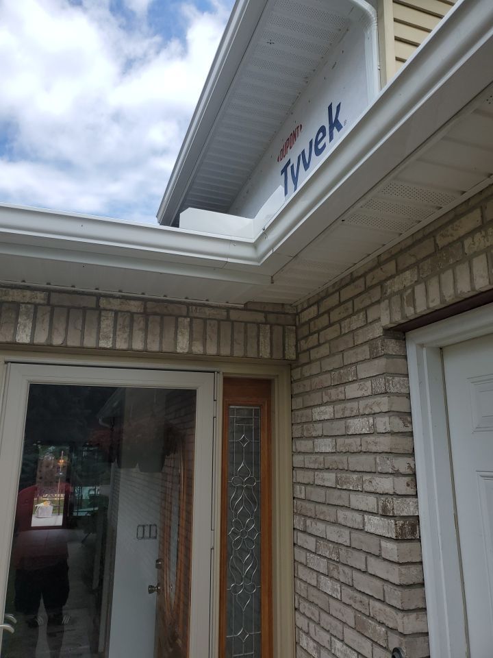 Gutter Installation using 5" Seamless Aluminum Gutters by Absolute Roofing and Construction