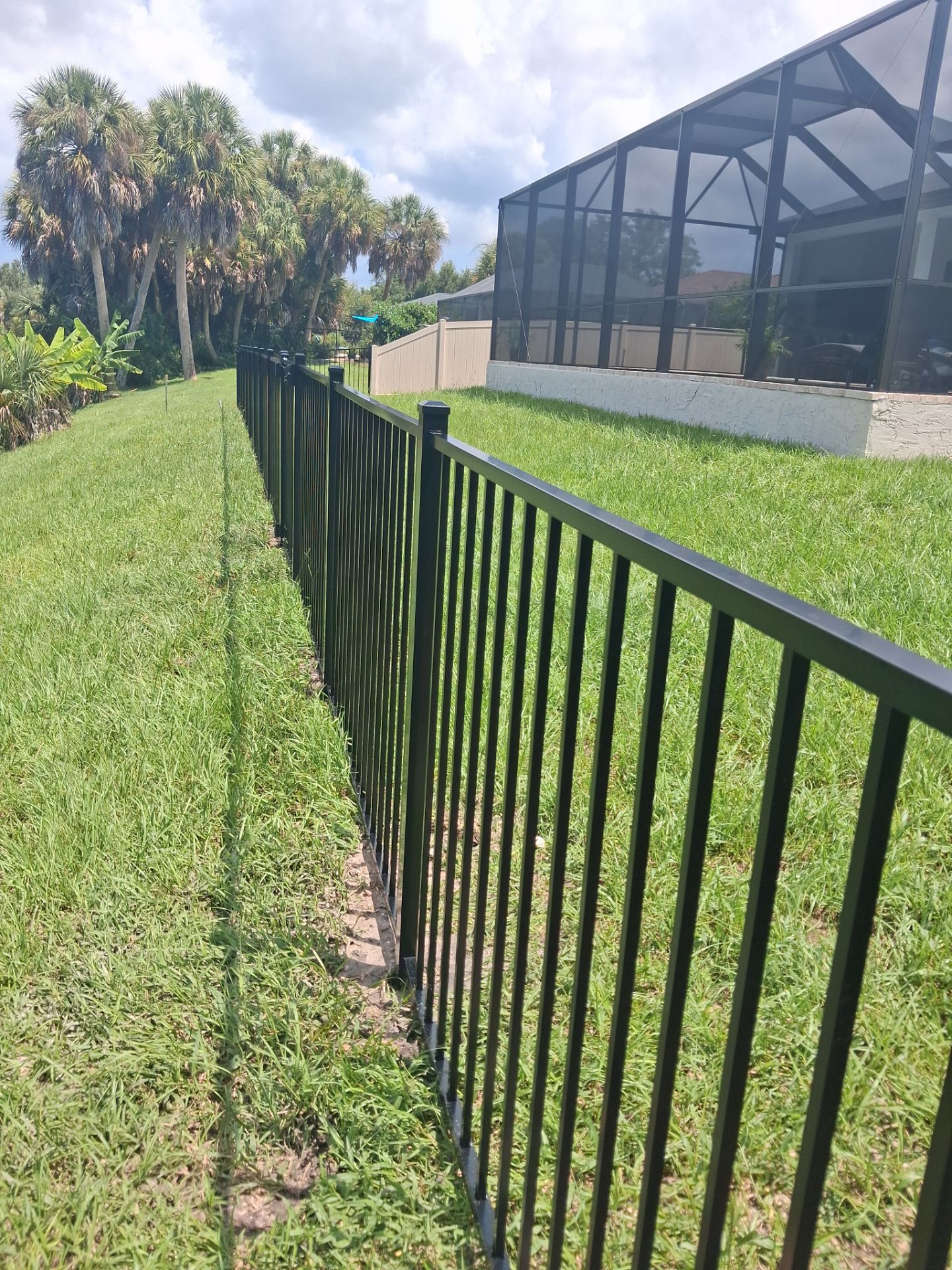 Vinyl Privacy Fencing and Aluminum Pool Security Installation in Port Charlotte by True Fence LLC