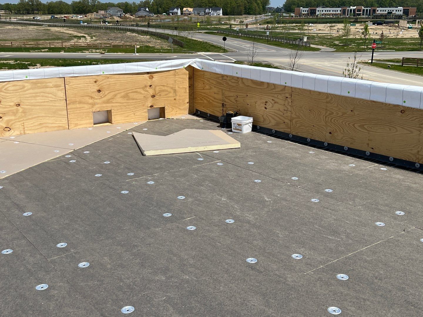 Commercial Roofing Installation using 60 mil rubber roof  by Nitro Roofing and Construction