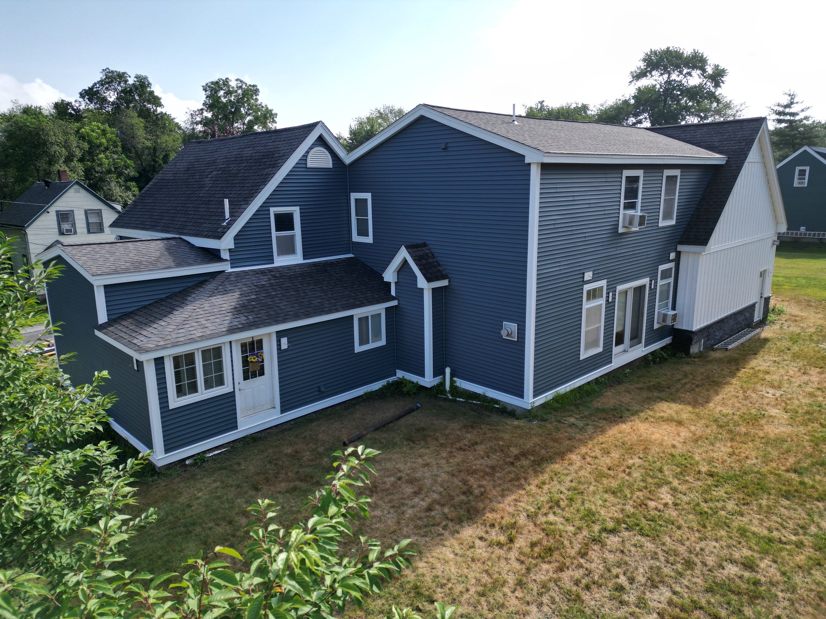 Premium Mixed-Material Siding Installation in North Billerica, MA by Mighty Dog Roofing of Greater Middlesex County