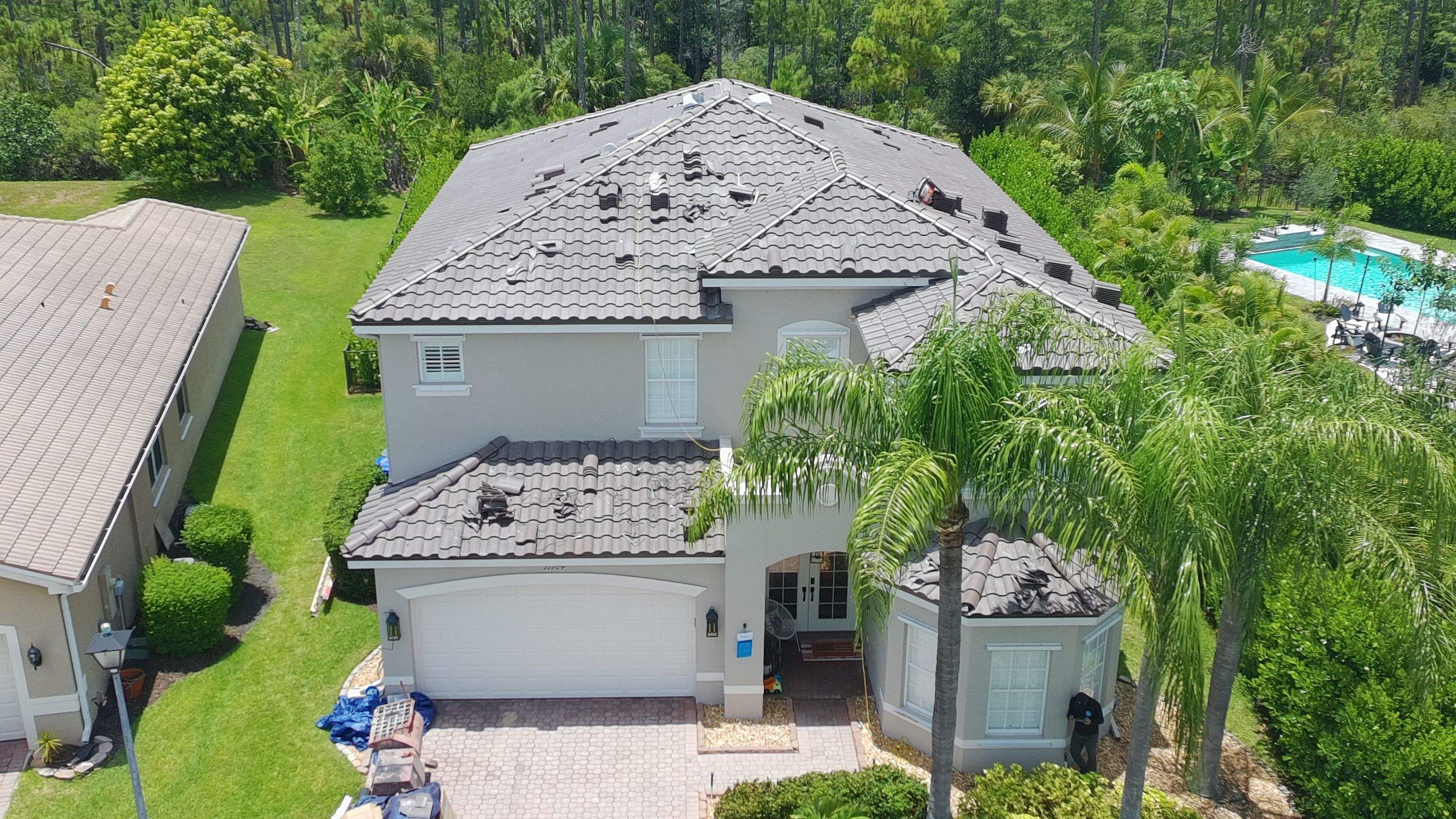 Concrete Tile Replacement in Botanica Lakes by International Roofing