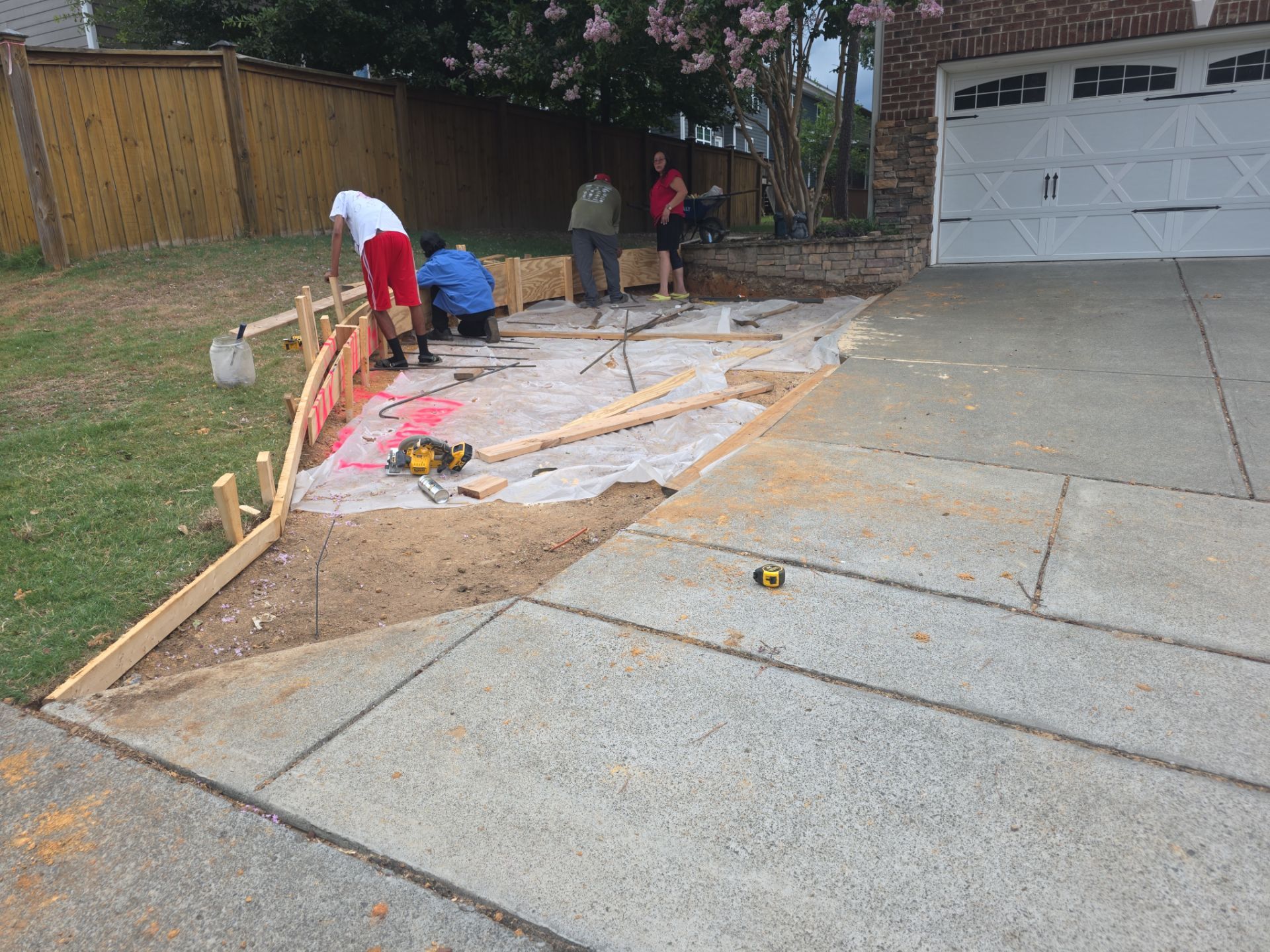 Concrete Driveway Expansion & Retaining Wall | Apex, NC by Elite Remodeling and Design LLC