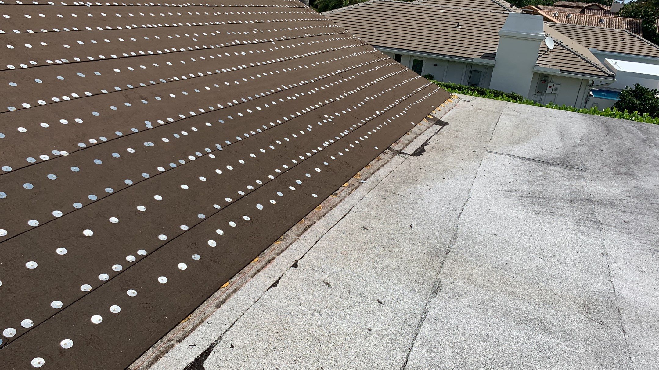 Residential Roofing Installation using 1" Nail strip metal roof by BLUES BROTHERS ROOFING