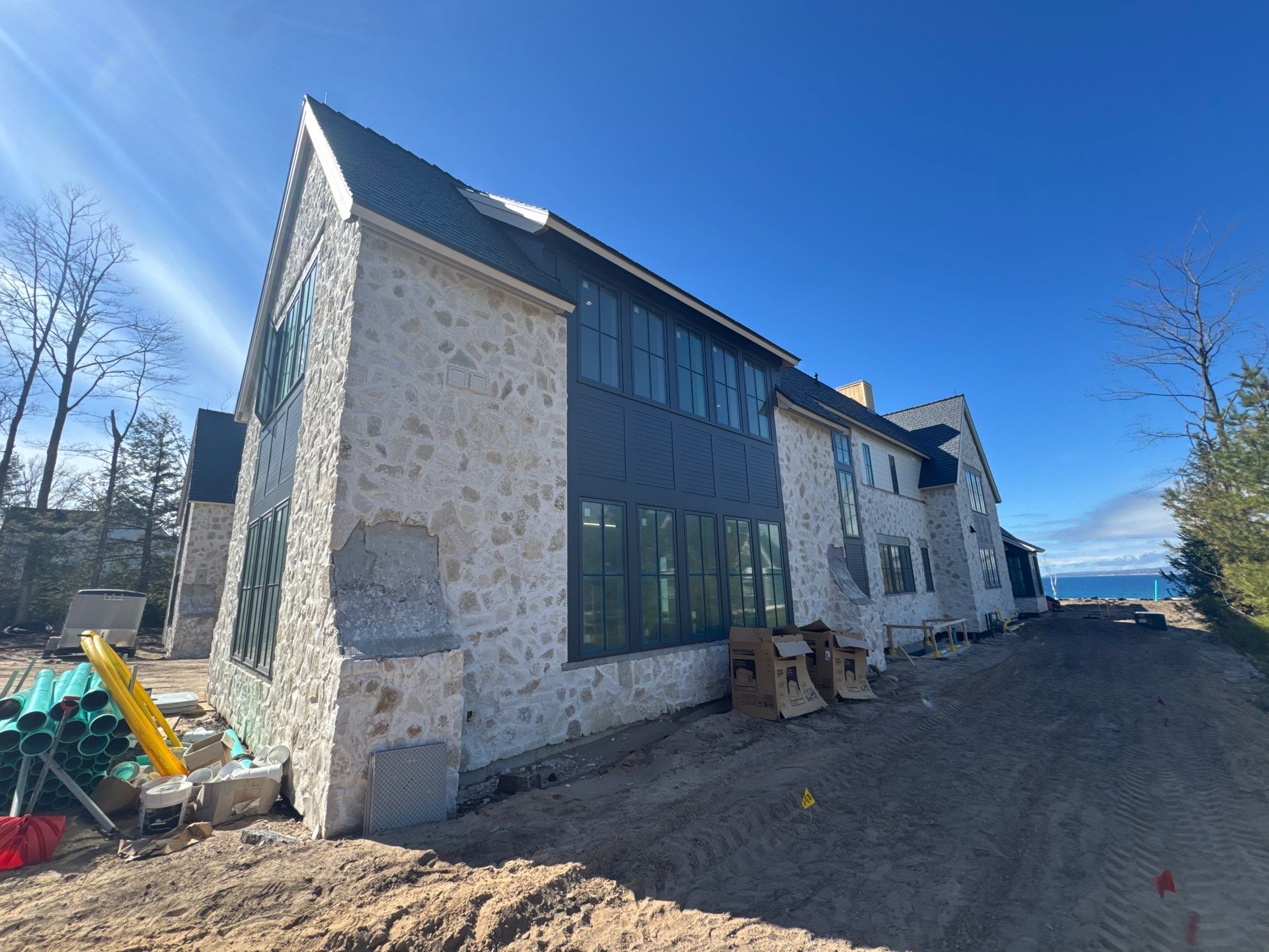 Half Round Gutter Installation for Petoskey Residence by Rainbow Seamless Systems