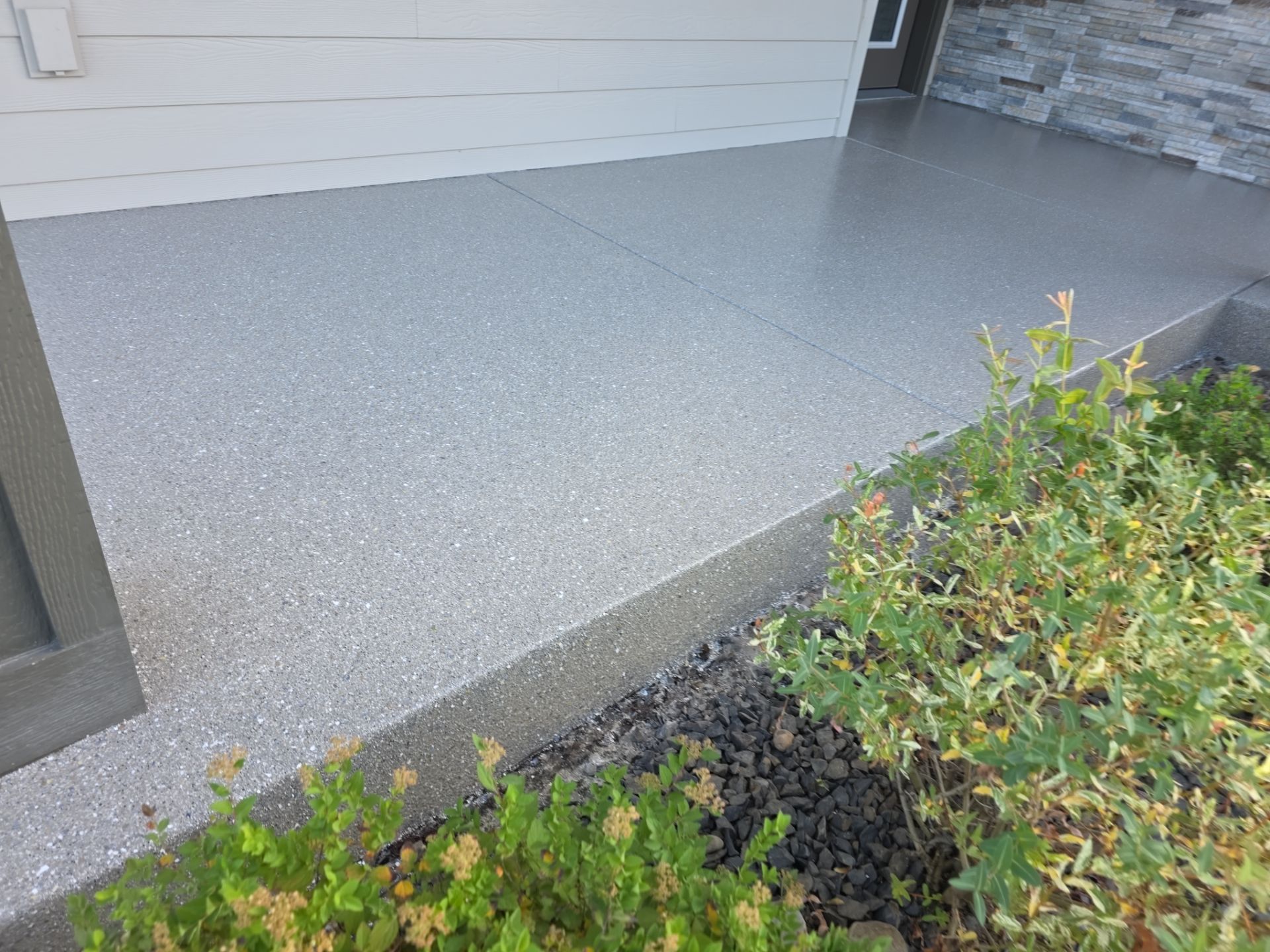 Front Porch and Back Patio Concrete Transformation in Liberty Lake by Croc Coatings, LLC