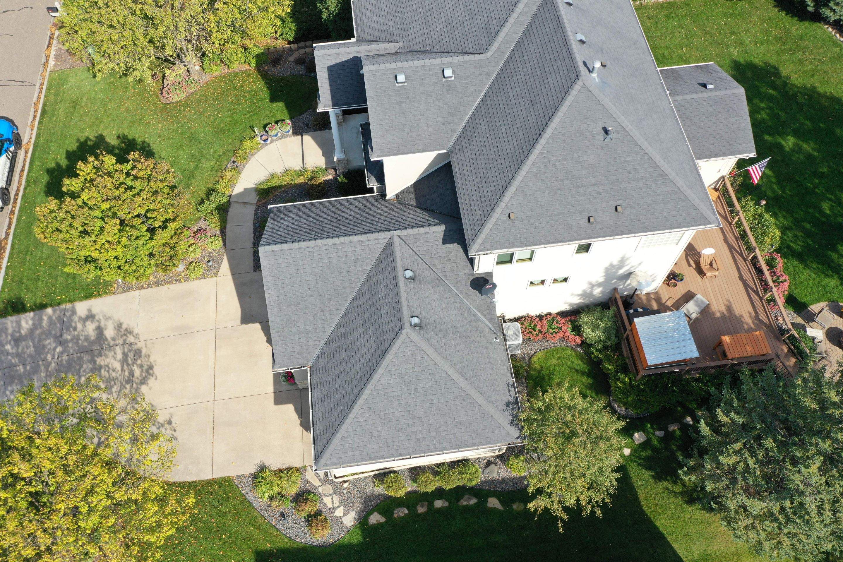 Residential Roofing Installation using Certainteed Landmark Moire Black by MODERN EXTERIOR SYSTEMS