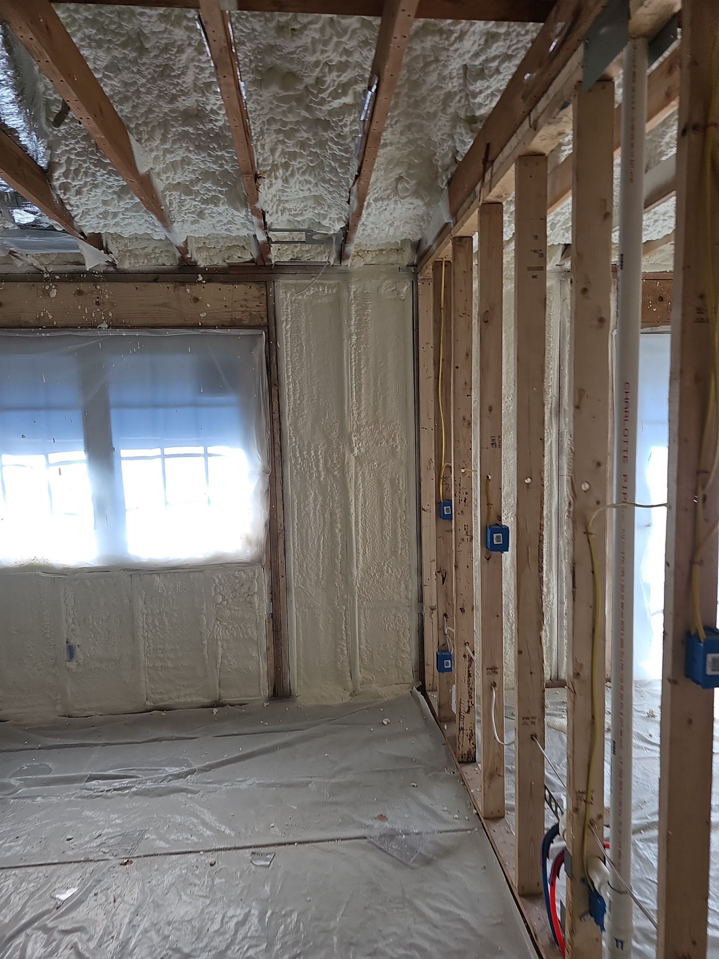 Basement Exterior Walls using Closed Cell Spray Foam by NYS Foam & Energy