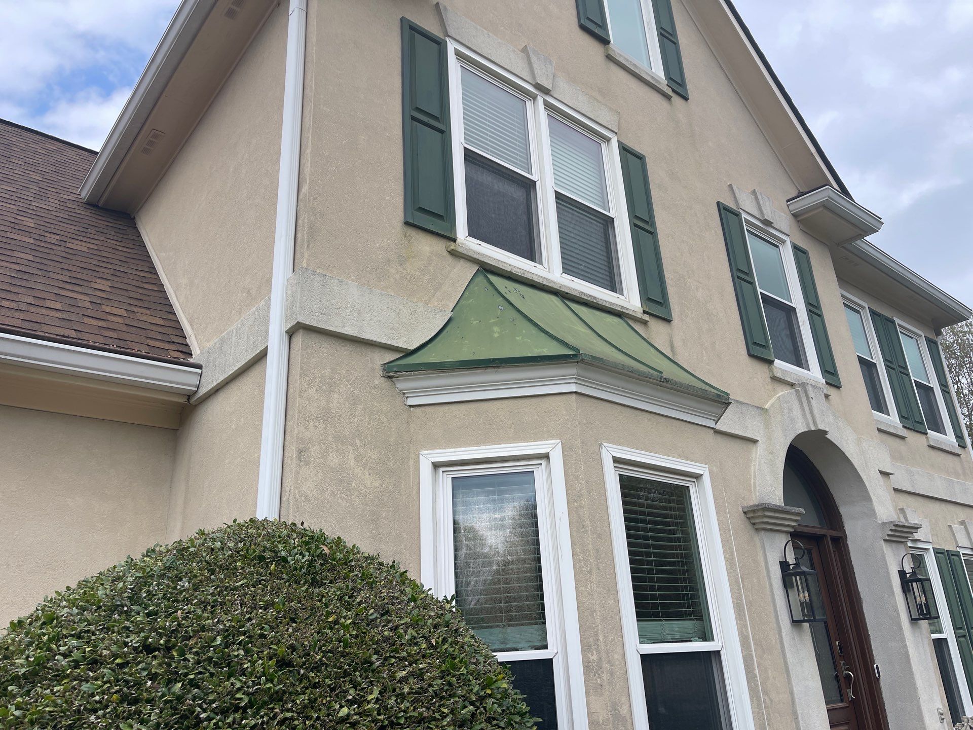 Exterior Painting using Sherwin-Williams and Rotted Wood Replacement by Nelson Exteriors 
