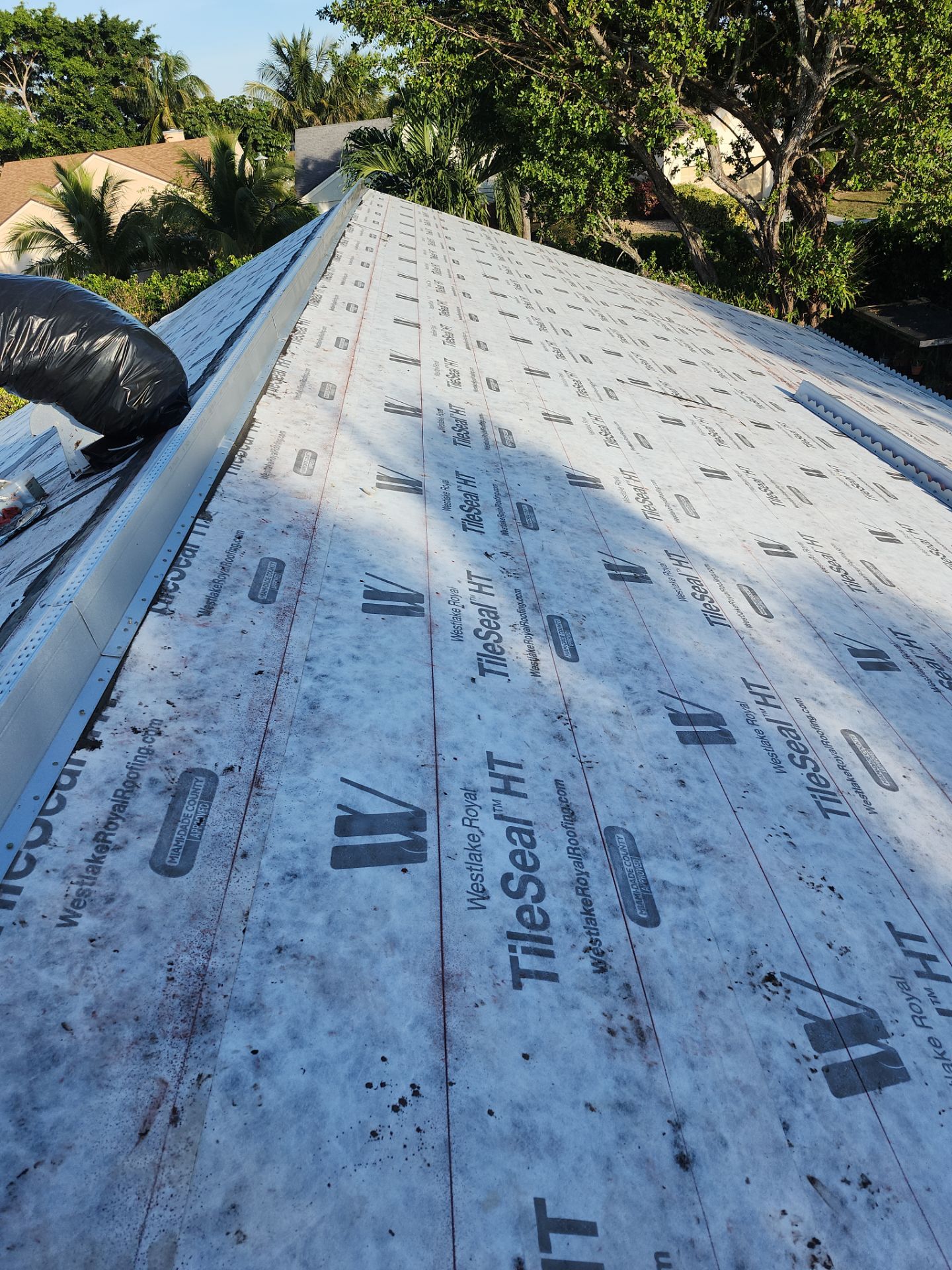 Concrete Tile Roof Replacement and Wood Decking Repair in Boca Raton by Aastro Roofing