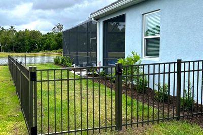 Aluminum Fence Installation using Black 3 Rail Aluminum Fence