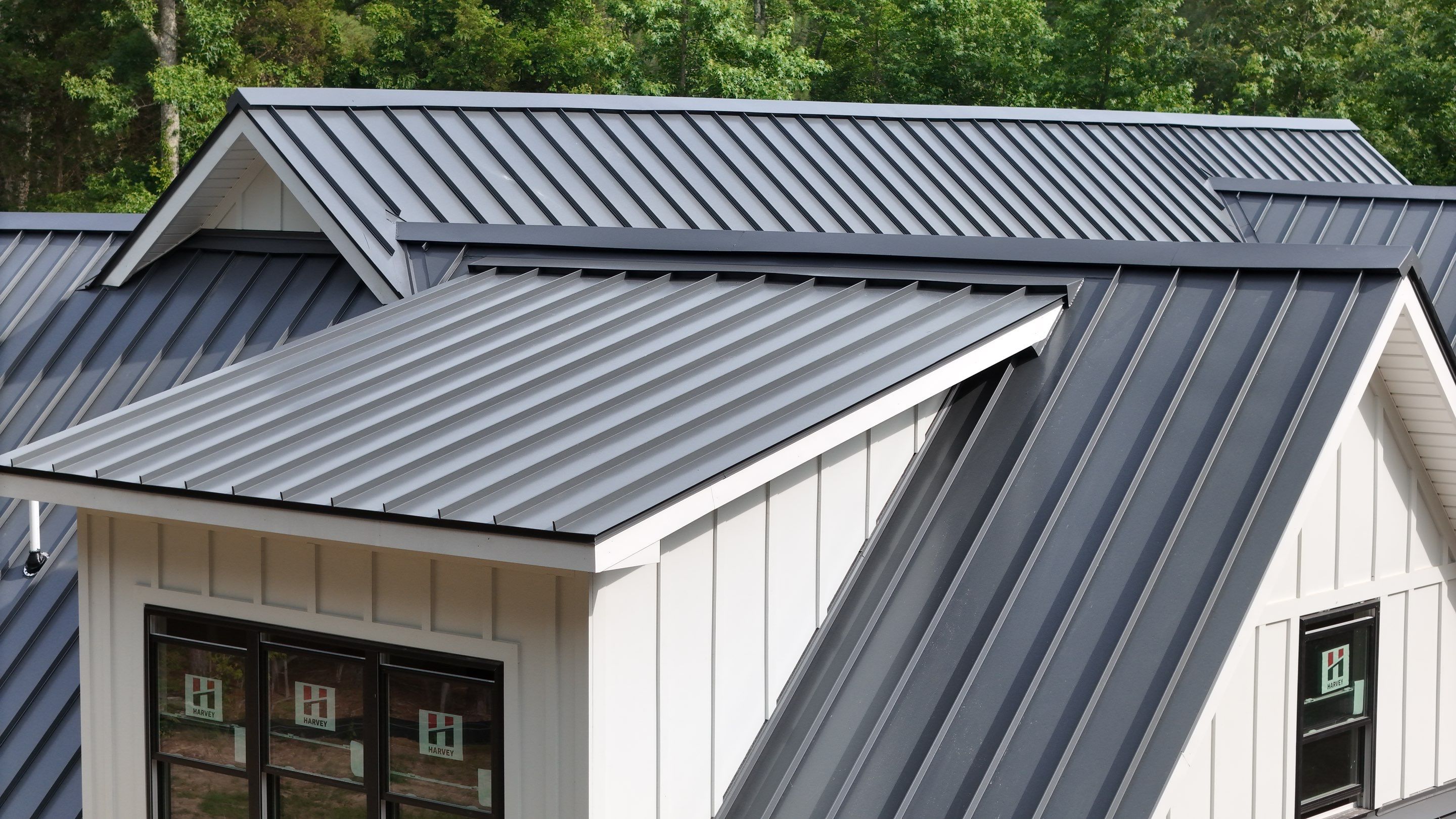 Custom New Construction Home Featuring Standing Seam Metal Roofing in Port Haywood by Cade Construction