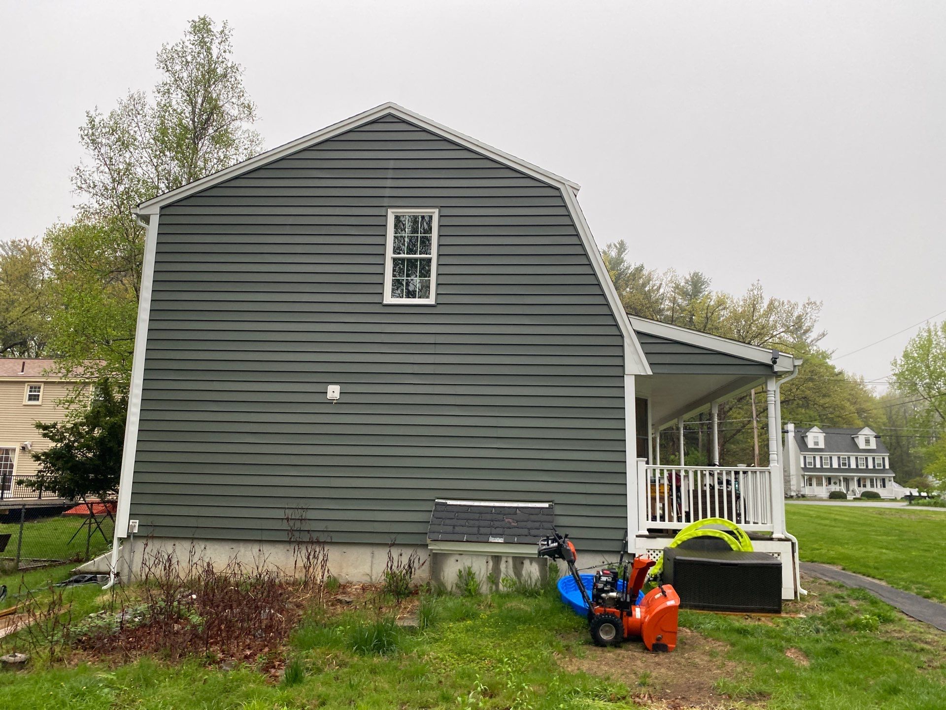 Full Roof Replacement & Farmers Porch Restoration – Asphalt + Standing Seam Metal by Mighty Dog Roofing of Greater Middlesex County