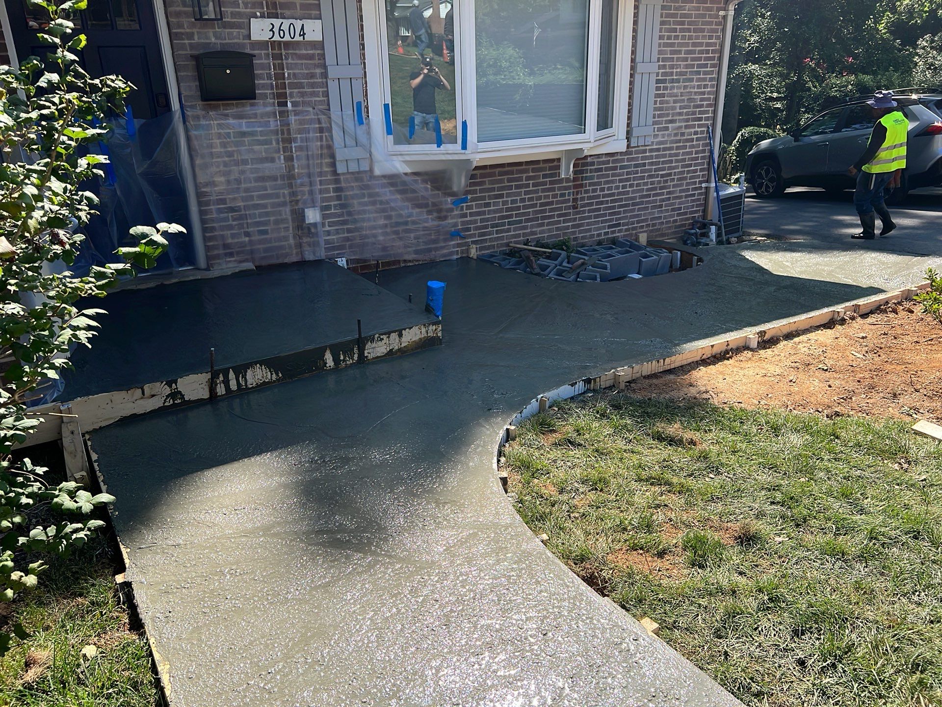 New walkway with stairs and a new front porch by Fairfax Contractors, LLC