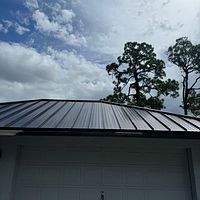 24ga 1.5" Mechanical Seam Dark Bronze by Total Roofing System The Metal Roof Experts