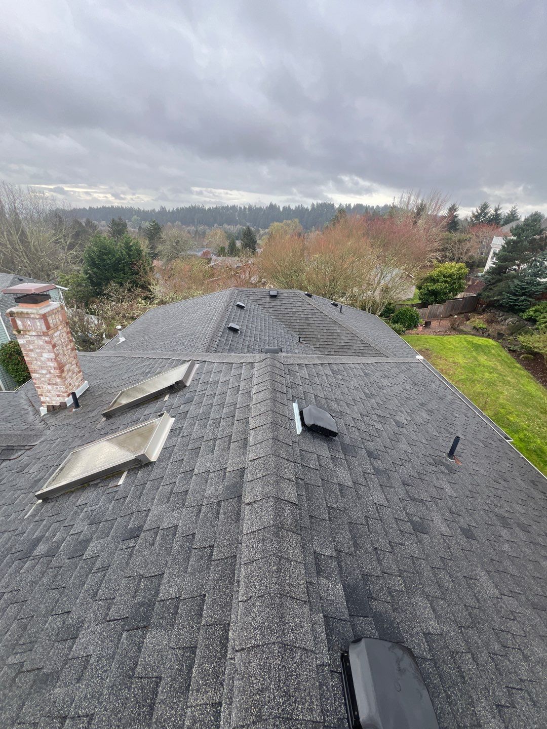 Residential Roofing Installation using IKO Dynasty (Color: Granite Black) by Orezona Building & Roofing Company, Inc.