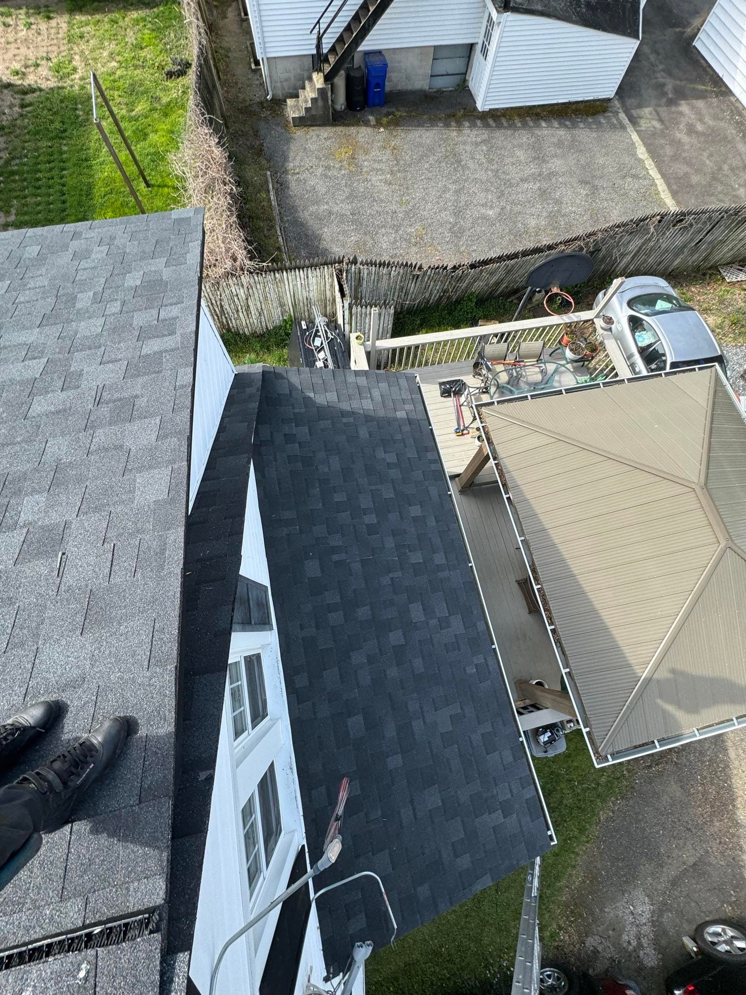 Charcoal Shingles by Reimagine Roofing