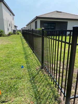 Aluminum Fence Installation using Black 3 Rail Aluminum Fence