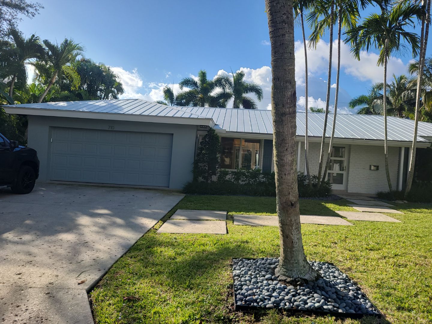 Metal Roof Maintenance and Fascia Replacement in Delray Beach by Aastro Roofing