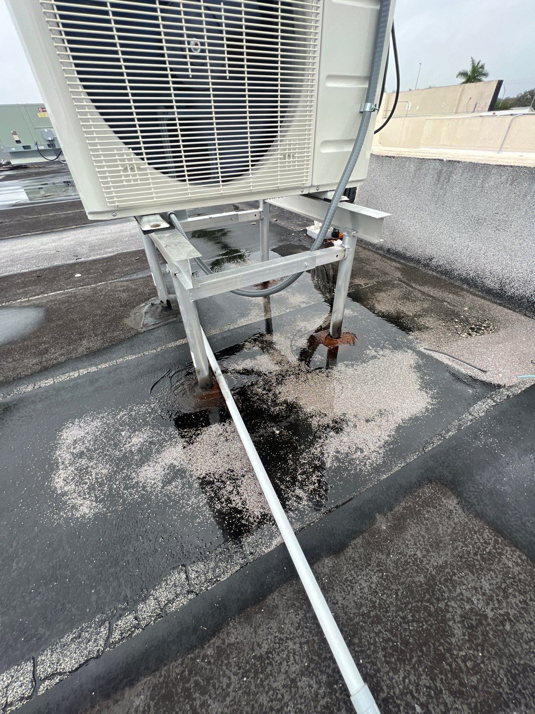 Commercial Roofing Repair using Roof Sealant by Four Peaks Roofing