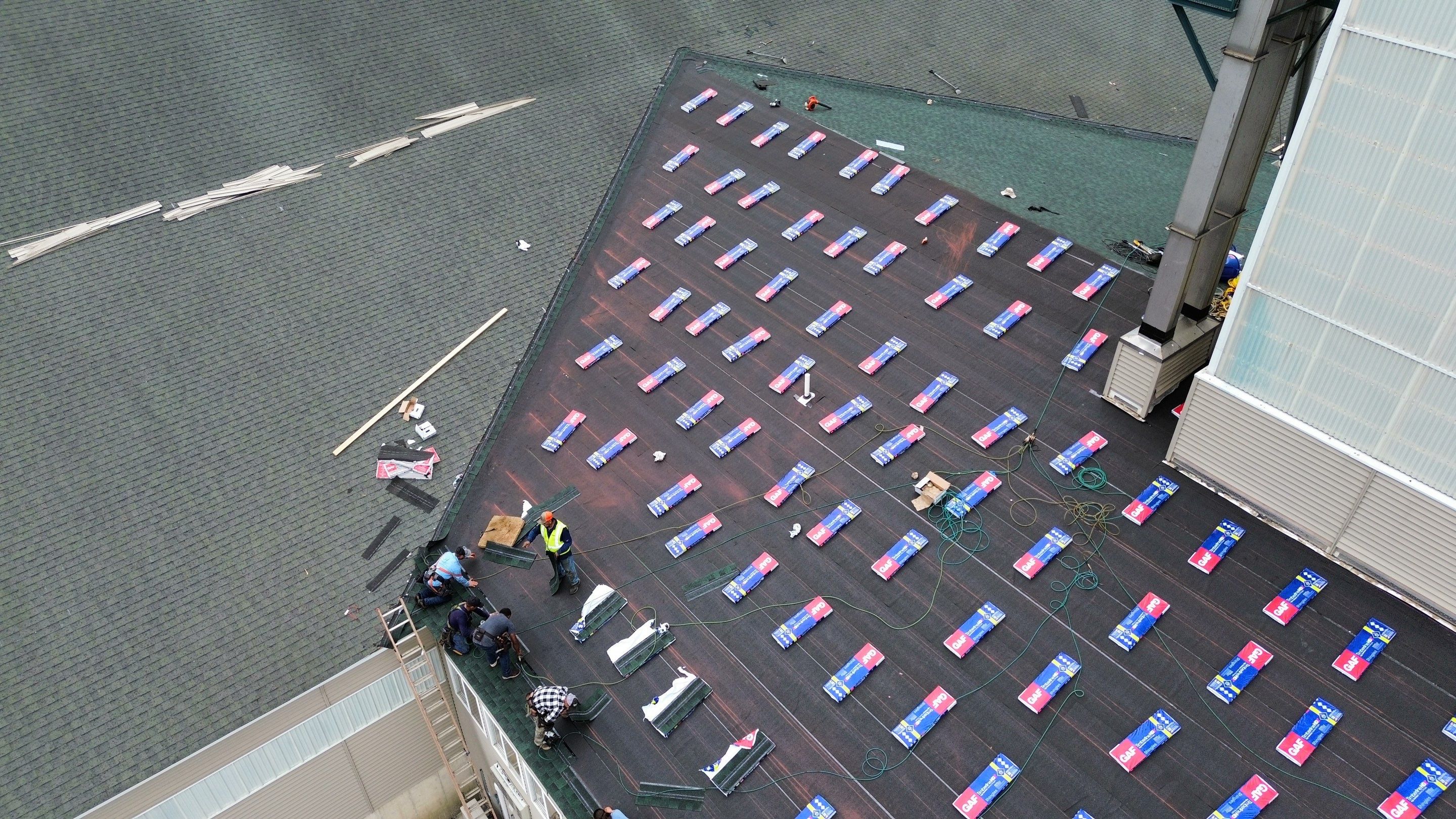 Commercial Roofing Installation using Timberline HDZ Shingles - Hunter Green by RoofX 